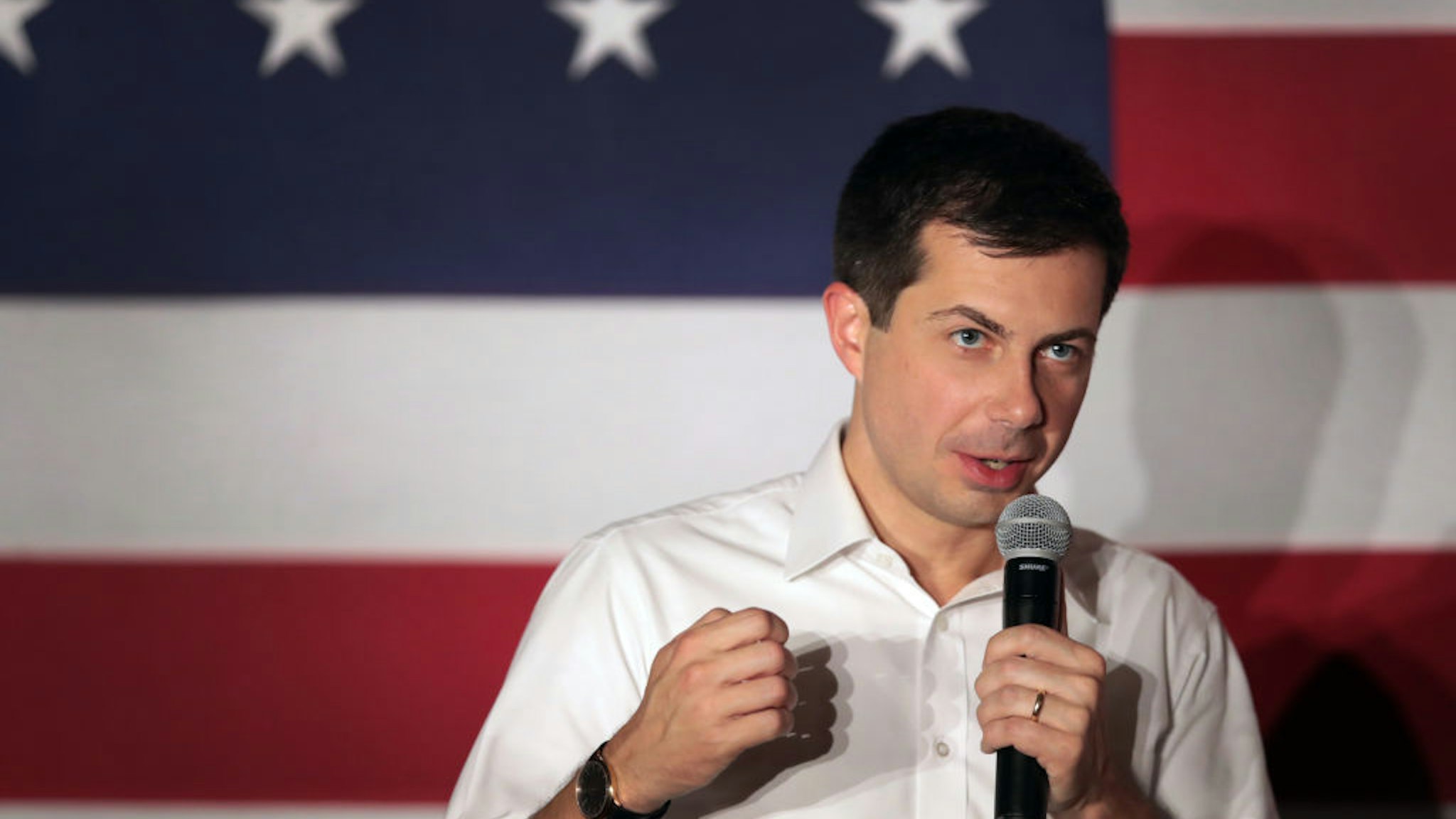 Pete Buttigieg speaks to guests during a campaign rally at the Elks Lodge