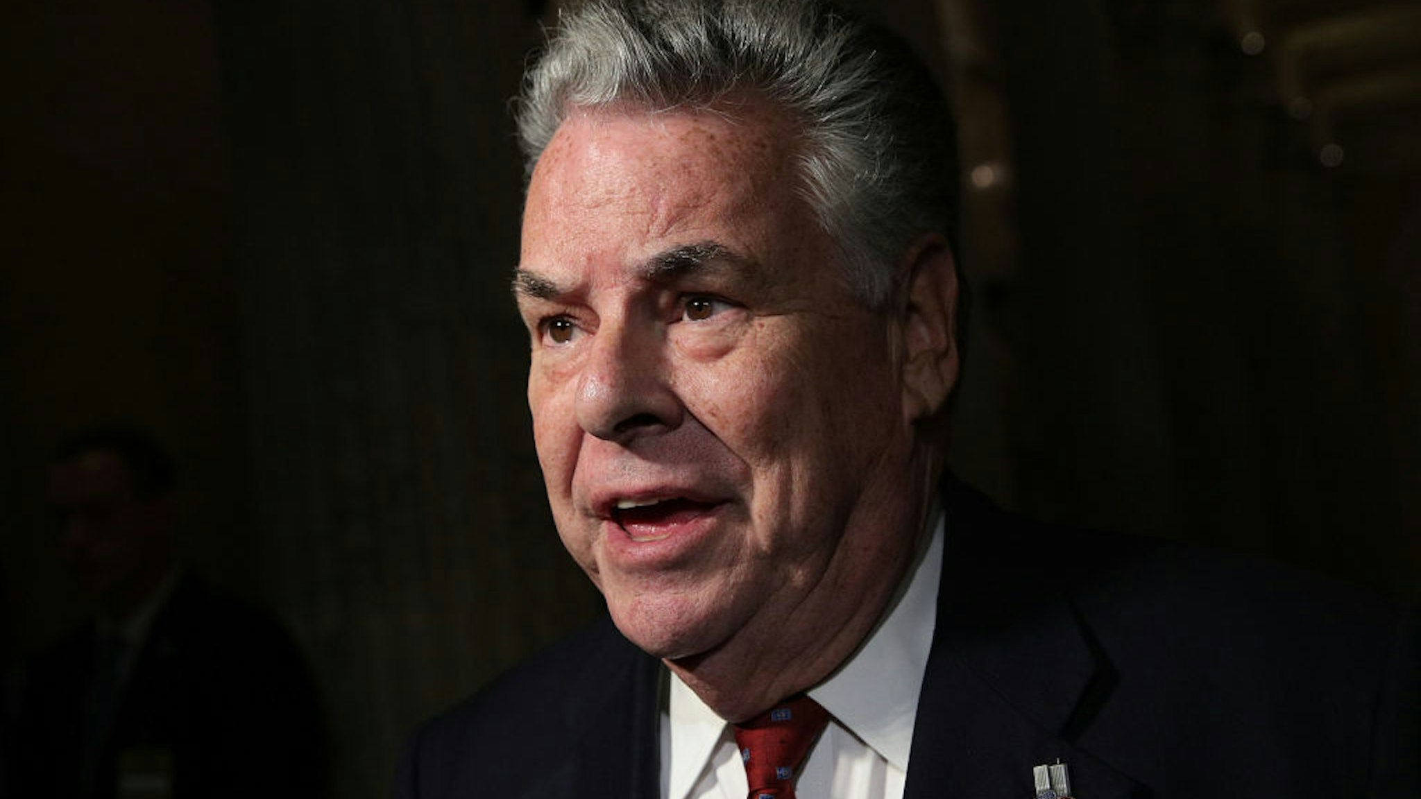 Peter King speaks to members of the media after President Donald Trump's visit to a House Republican Conference