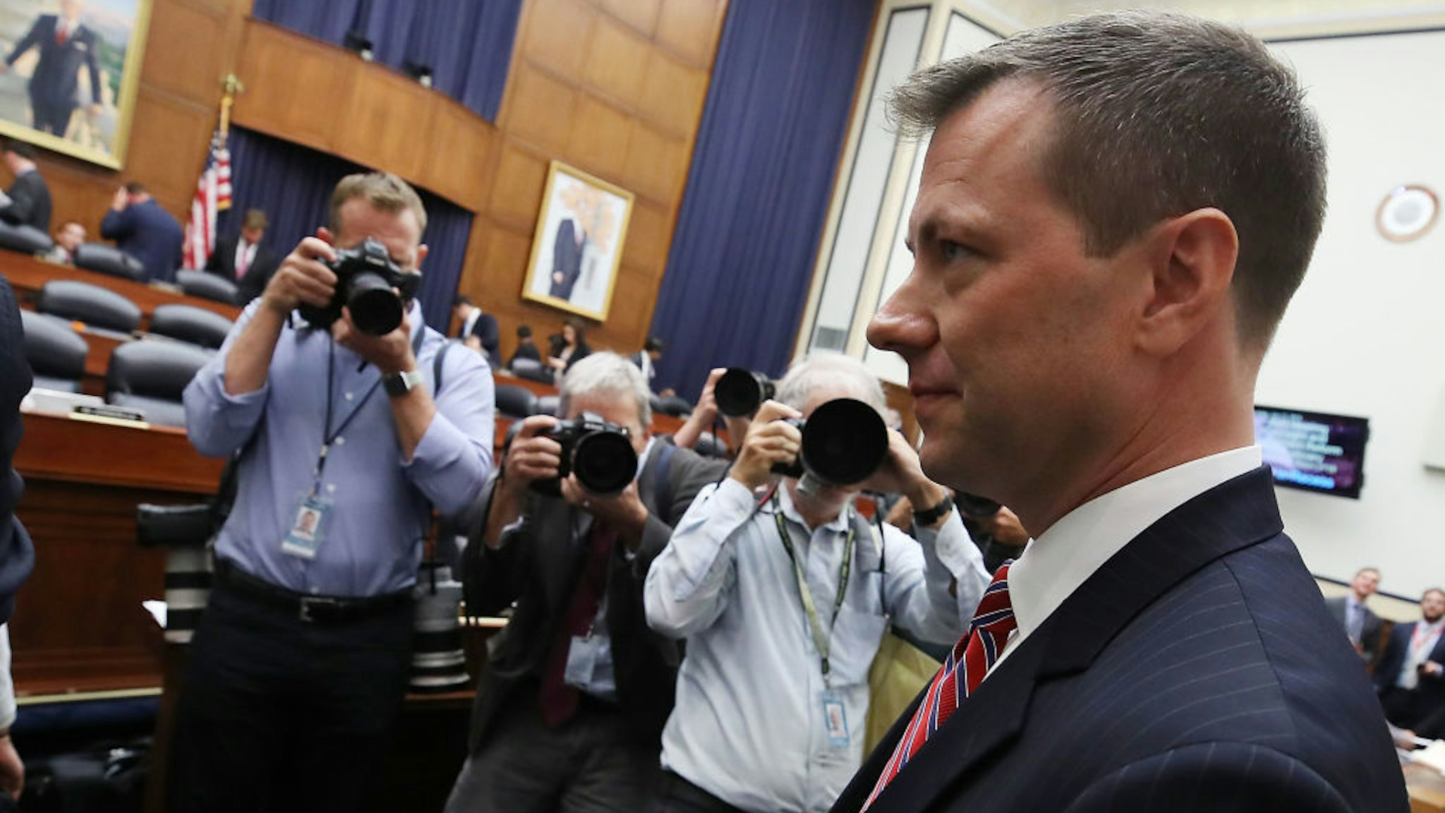Deputy Assistant FBI Director Peter Strzok walks away during a break in a joint committee hearing of the House Judiciary and Oversight and Government Reform committees in the Rayburn House Office Building on Capitol Hill July 12, 2018 in Washington, DC. While involved in the probe into Hillary ClintonÕs use of a private email server in 2016, Strzok exchanged text messages with FBI attorney Lisa Page that were critical of Trump. After learning about the messages, Mueller removed Strzok from his investigation into whether the Trump campaign colluded with Russia to win the 2016 presidential election.Ê (Photo by Mark Wilson/Getty Images)