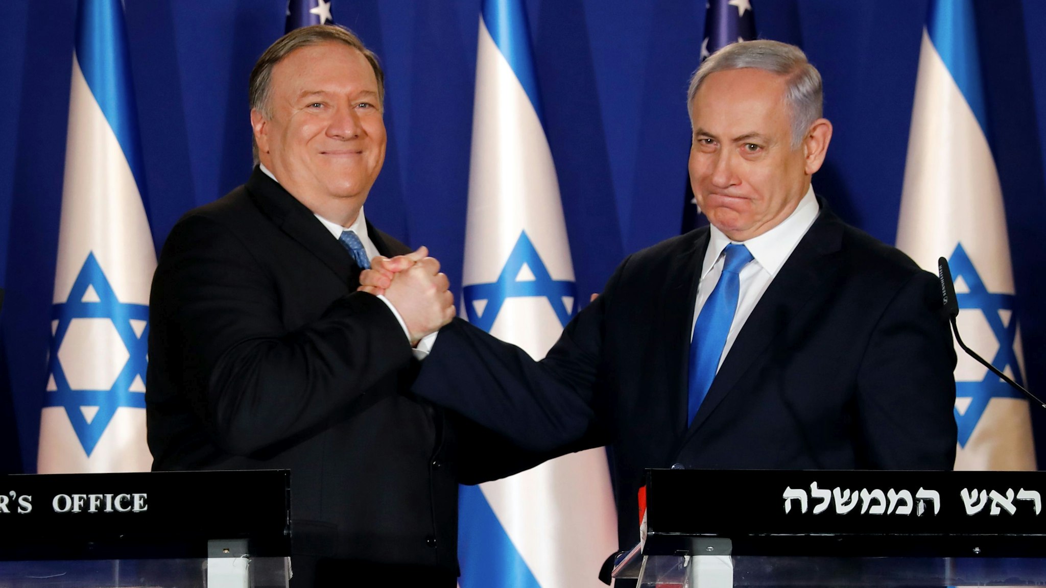 Israeli Prime Minister Benjamin Netanyahu (R) welcomes US Secretary of State Mike Pompeo to his residence in Jerusalem on March 21, 2019. - Pompeo issued a thinly veiled jab at US Democrats over anti-Semitism, following controversial comments by a Muslim congresswoman over American support for Israel.