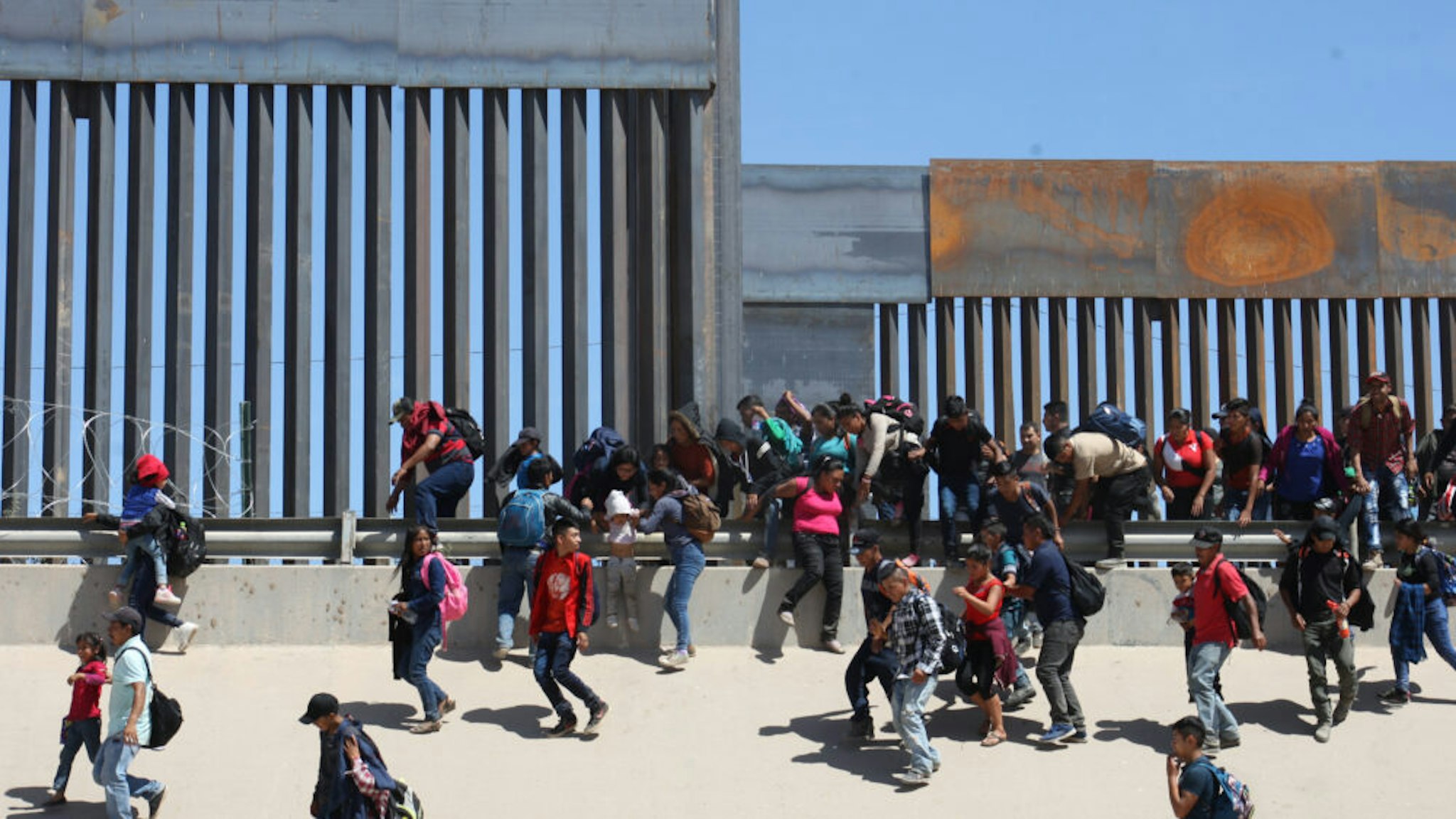 500 Central American migrants entered the United States illegally under the international bridge Santa Fe in Ciudad Juarez Chihuahua border with Texas is the largest group that was able to intern the United States in this exodus of Central Americans on 9 May 2019.
