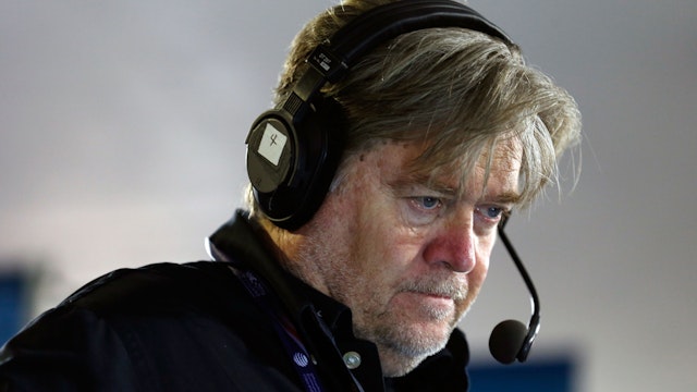 Stephen K. Bannon looks at his computer to see who will be the next caller he will talk to while hosting Brietbart News Daily on SiriusXM Patriot at Quicken Loans Arena on July 20, 2016 in Cleveland, Ohio.