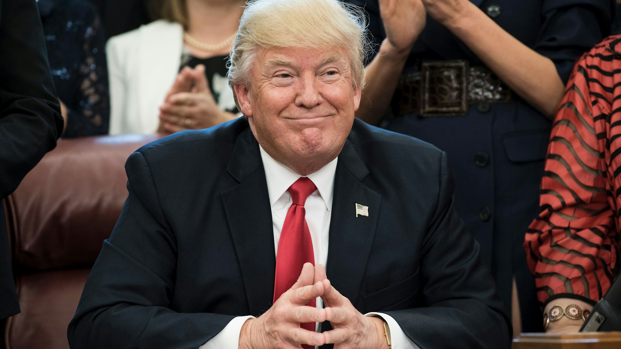 US President Donald Trump smiles during a national teacher of the year event in the Oval Office of the White House April 26, 2017 in Washington, DC.