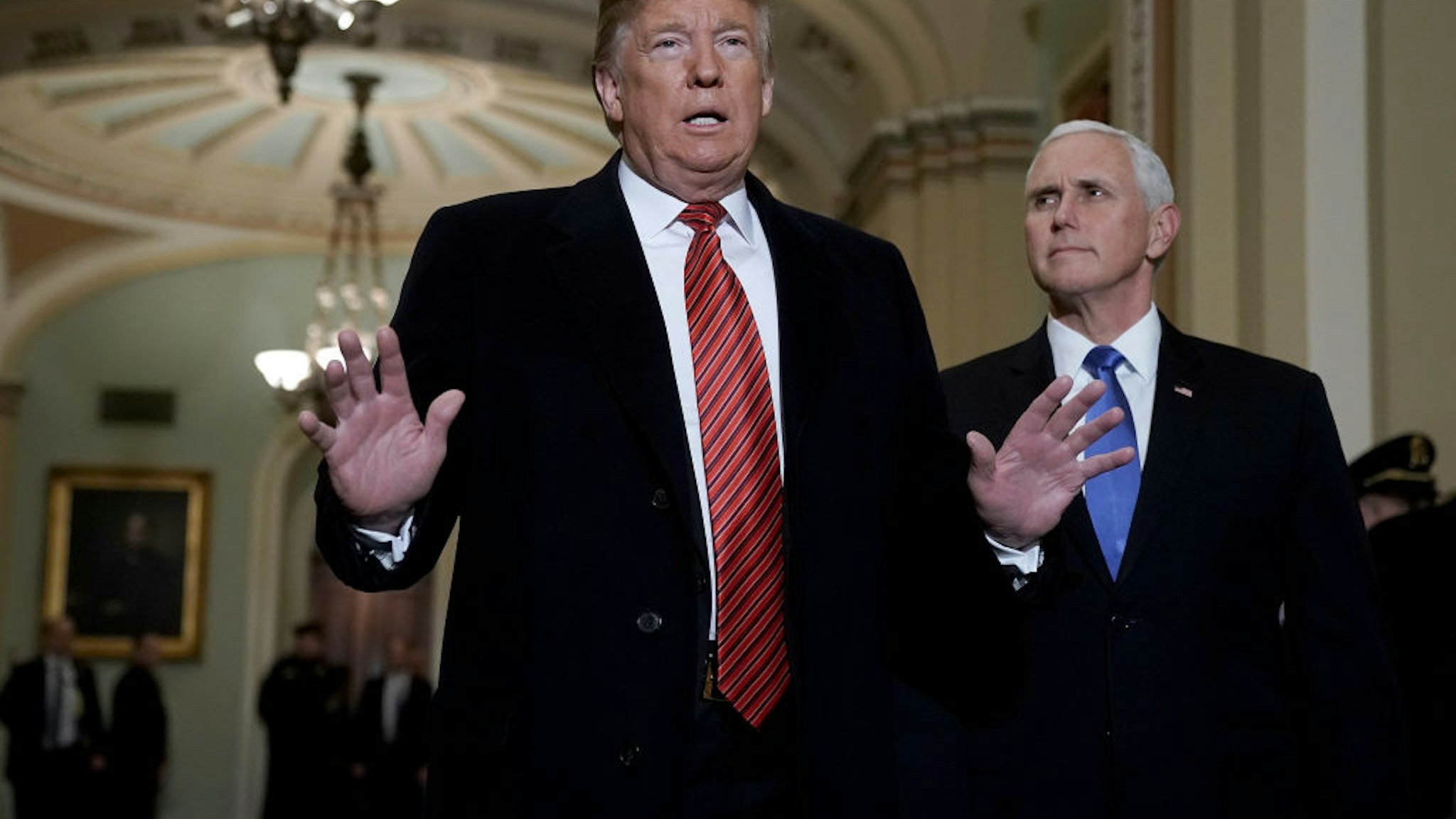 President Donald Trump and Vice President Mike Pence arrive at the U.S. Capitol to attend the weekly Republican Senate policy luncheon
