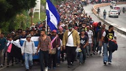 Caravan Honduran migrants take part in a caravan towards the United States in Chiquimula, Guatemala on October 17, 2018. - A migrant caravan set out on October 13 from the impoverished, violence-plagued country and was headed north on the long journey through Guatemala and Mexico to the US border.