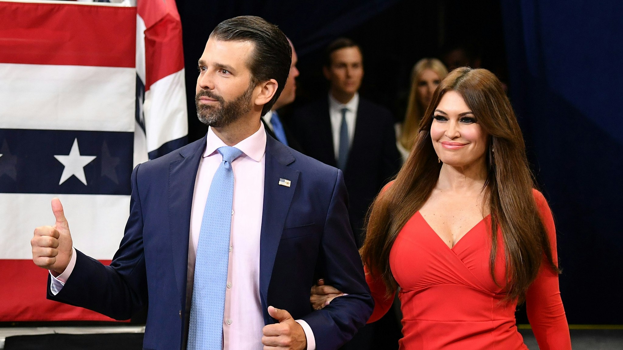 Kimberly Guilfoyle (R) and Donald Trump Jr. arrive at a rally for US President Donald Trump, to officially launch the Trump 2020 campaign, at the Amway Center in Orlando, Florida on June 18, 2019. - Trump kicks off his reelection campaign at what promised to be a rollicking evening rally in Orlando.