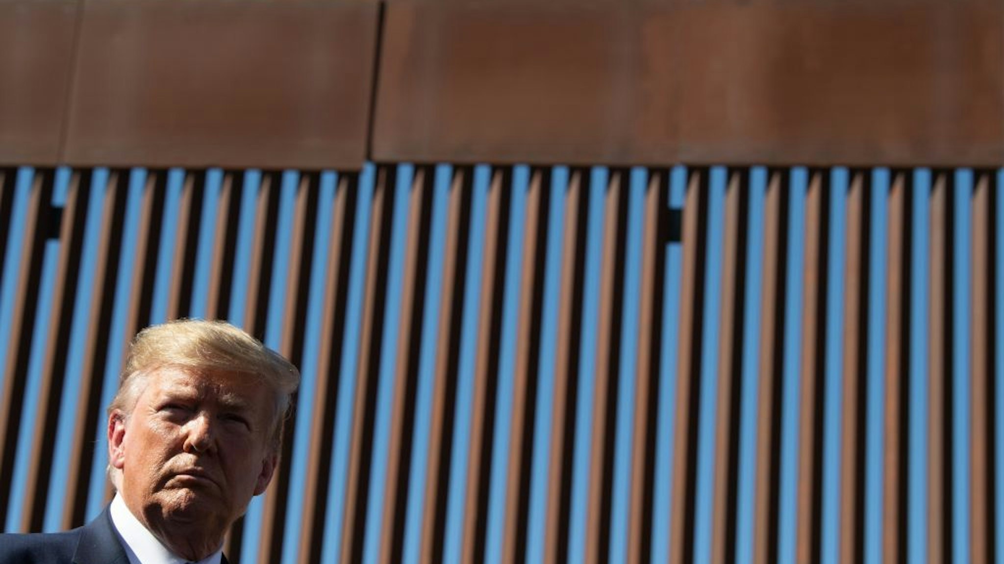 US President Donald Trump visits the US-Mexico border fence in Otay Mesa, California on September 18, 2019.