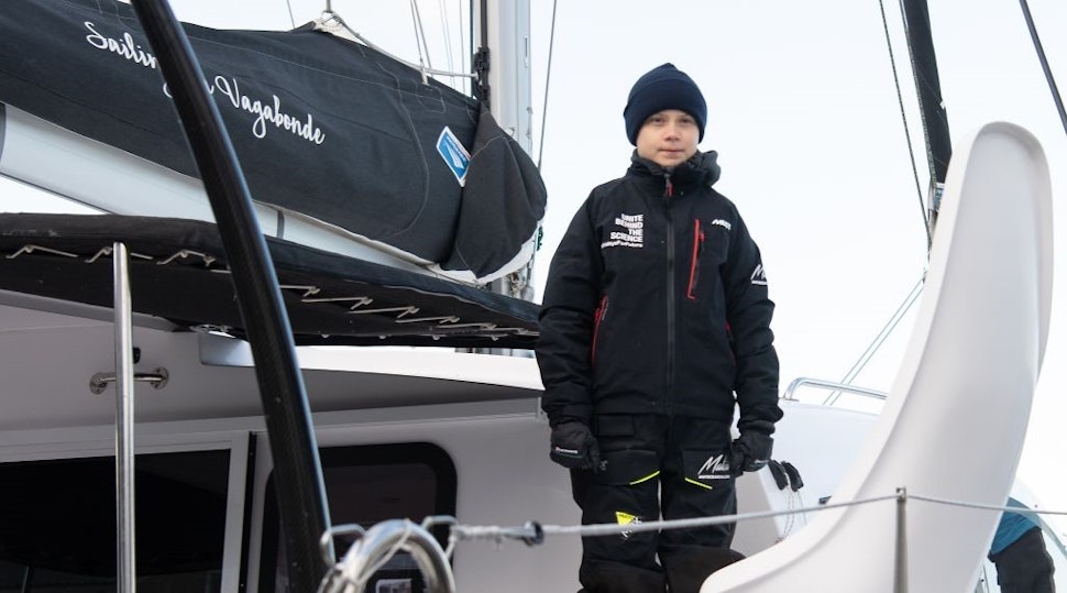 Swedish climate activist Greta Thunberg stands aboard the catamaran La Vagabonde as she sets sail to Europe in Hampton, Virginia, on November 13, 2019. - Extremely educational is how Greta Thunberg sums up her North American sojourn as she prepares to cross the Atlantic once more, this time bound back for Europe. The 16-year-old Swede, who became world famous for founding the school strikes for the climate, will set sail Wednesday morning, weather permitting, after 11 hectic weeks of criss-crossing the US and Canada, making headlines at every turn.