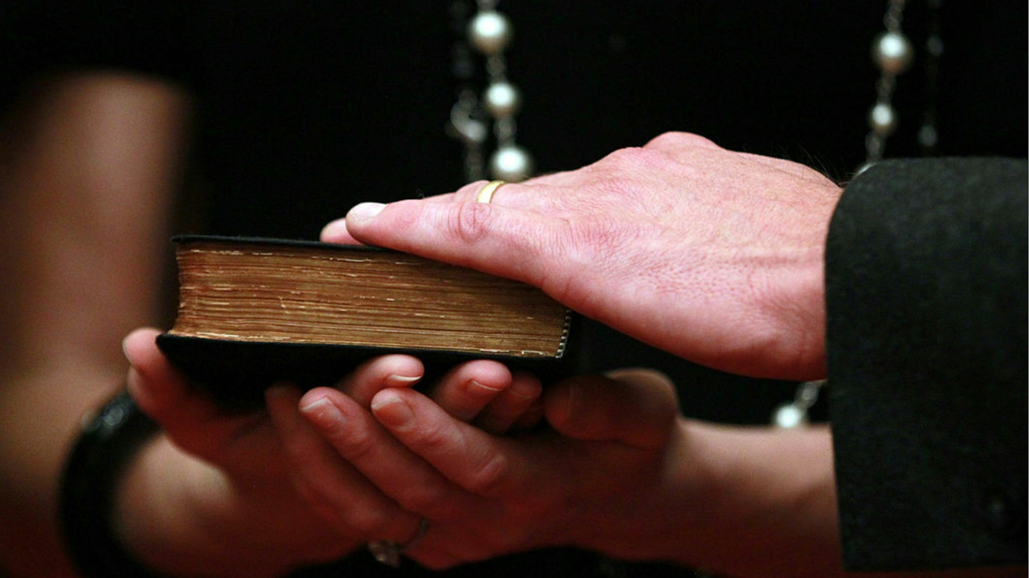 Gavin Newsom places his hand on a bible held by his wife Jennifer Siebel-Newsom as he is sworn in as the 49th Lt. Governor of California at the California State Capitol on January 10, 2011 in Sacramento, California.