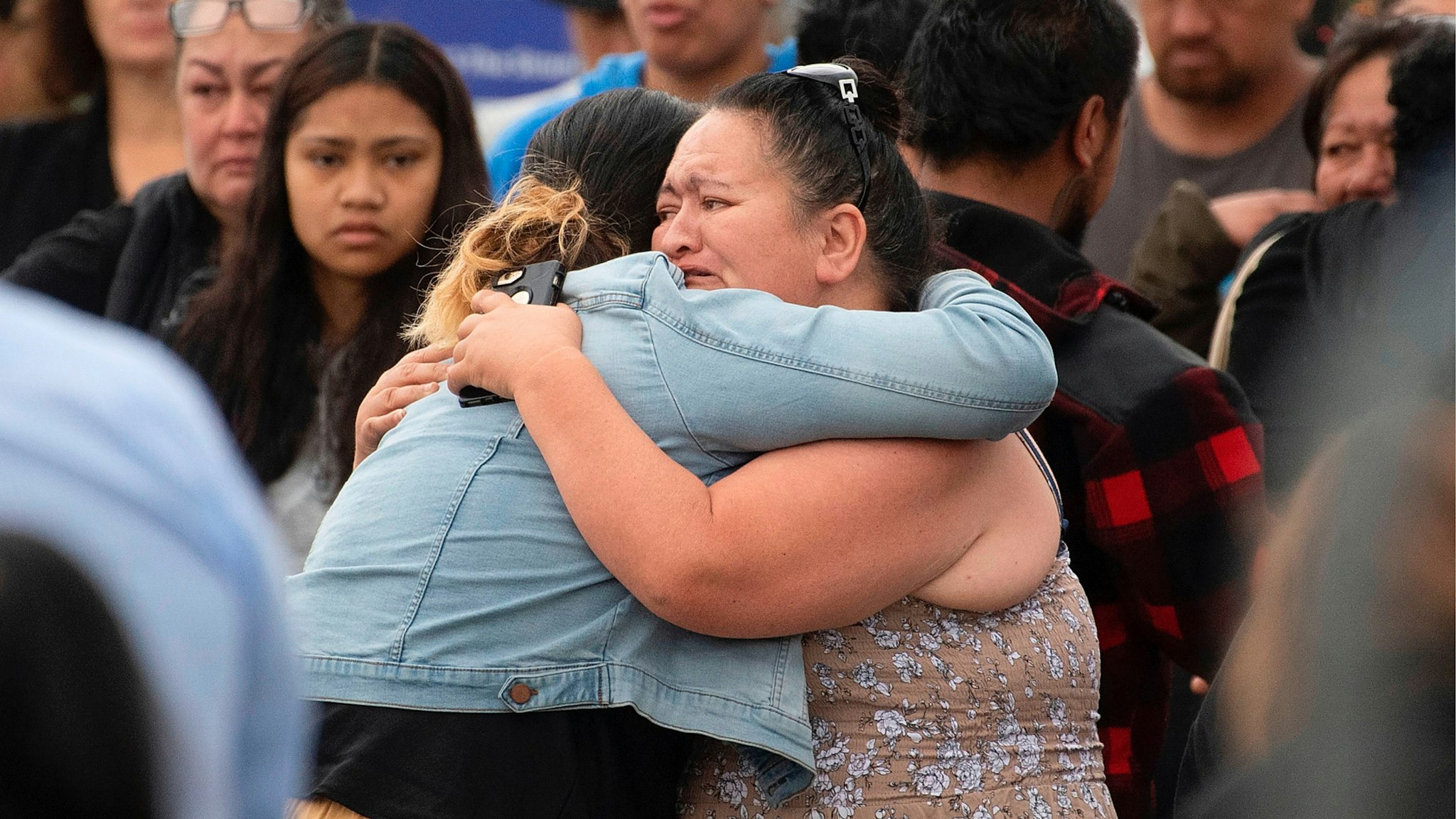 Friends and family of those lost on White Island when it erupted on December 9, arrive back into Whakatane after traveling on a White Island Tours boat for a blessing out at sea in Whakatane, New Zealand on December 13, 2019.