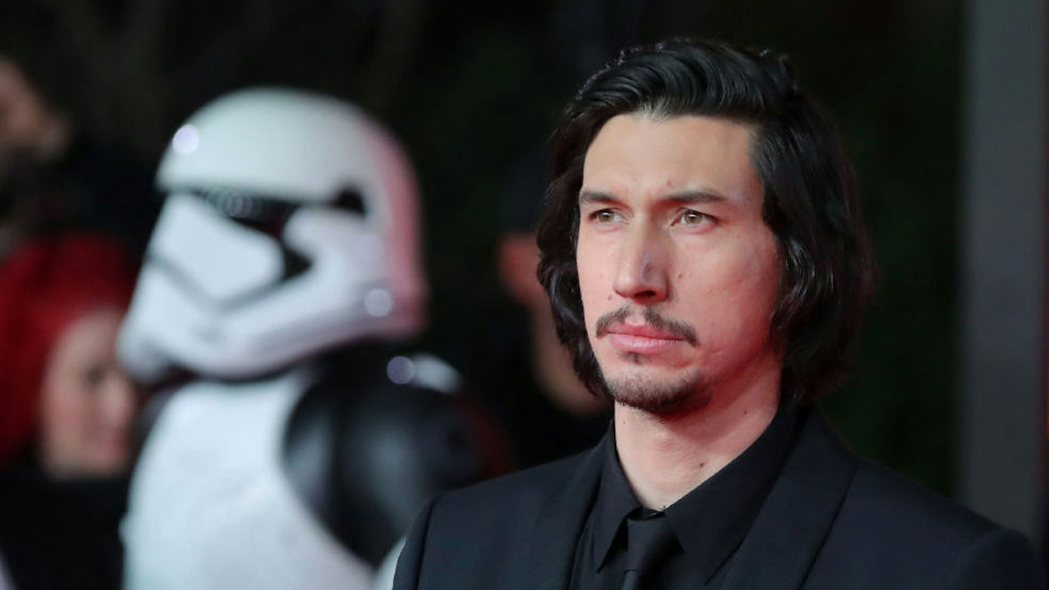 US actor Adam Driver poses on the red carpet for the European Premiere of Star Wars: The Last Jedi at the Royal Albert Hall in London on December 12, 2017. (Photo by Daniel LEAL-OLIVAS / AFP) (Photo credit should read DANIEL LEAL-OLIVAS/AFP via Getty Images)