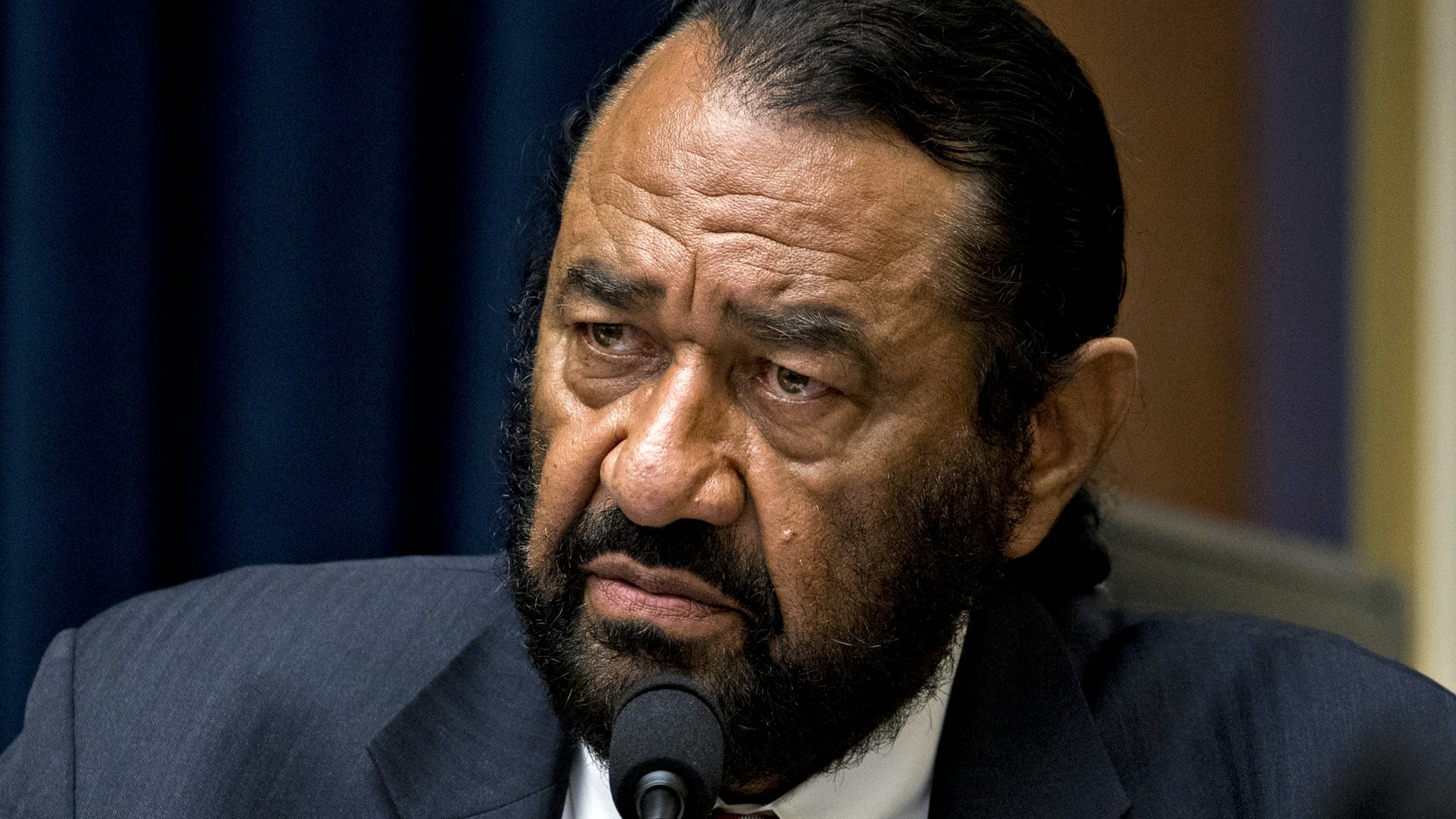 Representative Al Green, a Democrat from Texas, listens while questioning David Marcus, head of blockchain with Facebook Inc., not pictured, during a House Financial Services Committee hearing in Washington, D.C., U.S., on Wednesday, July 17, 2019. Republican and Democratic Senators sharply questioned Facebook Inc.'s plan to create its own digital money, adding to a chorus of skepticism across Washington and underscoring the challenges the company faces in getting its cryptocurrency off the ground.