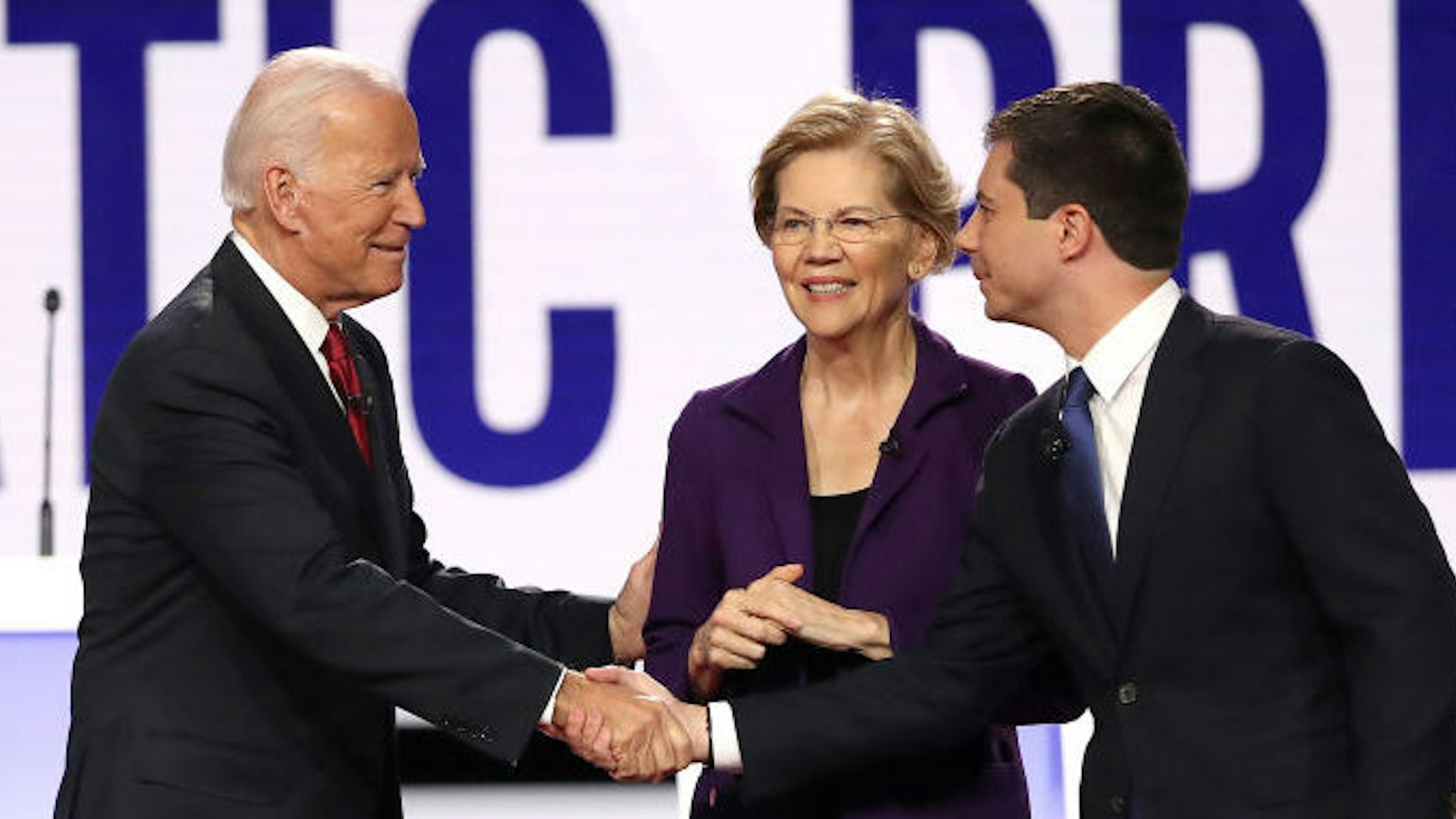 Democratic presidential candidates (L-R) Sen. Bernie Sanders (I-VT), former Vice President Joe Biden, Sen. Elizabeth Warren (D-MA) and South Bend, Indiana Mayor Pete Buttigieg enter the stage before the Democratic Presidential Debate at Otterbein University on October 15, 2019 in Westerville, Ohio. A record 12 presidential hopefuls are participating in the debate hosted by CNN and The New York Times. (Photo by Win McNamee/Getty Images)