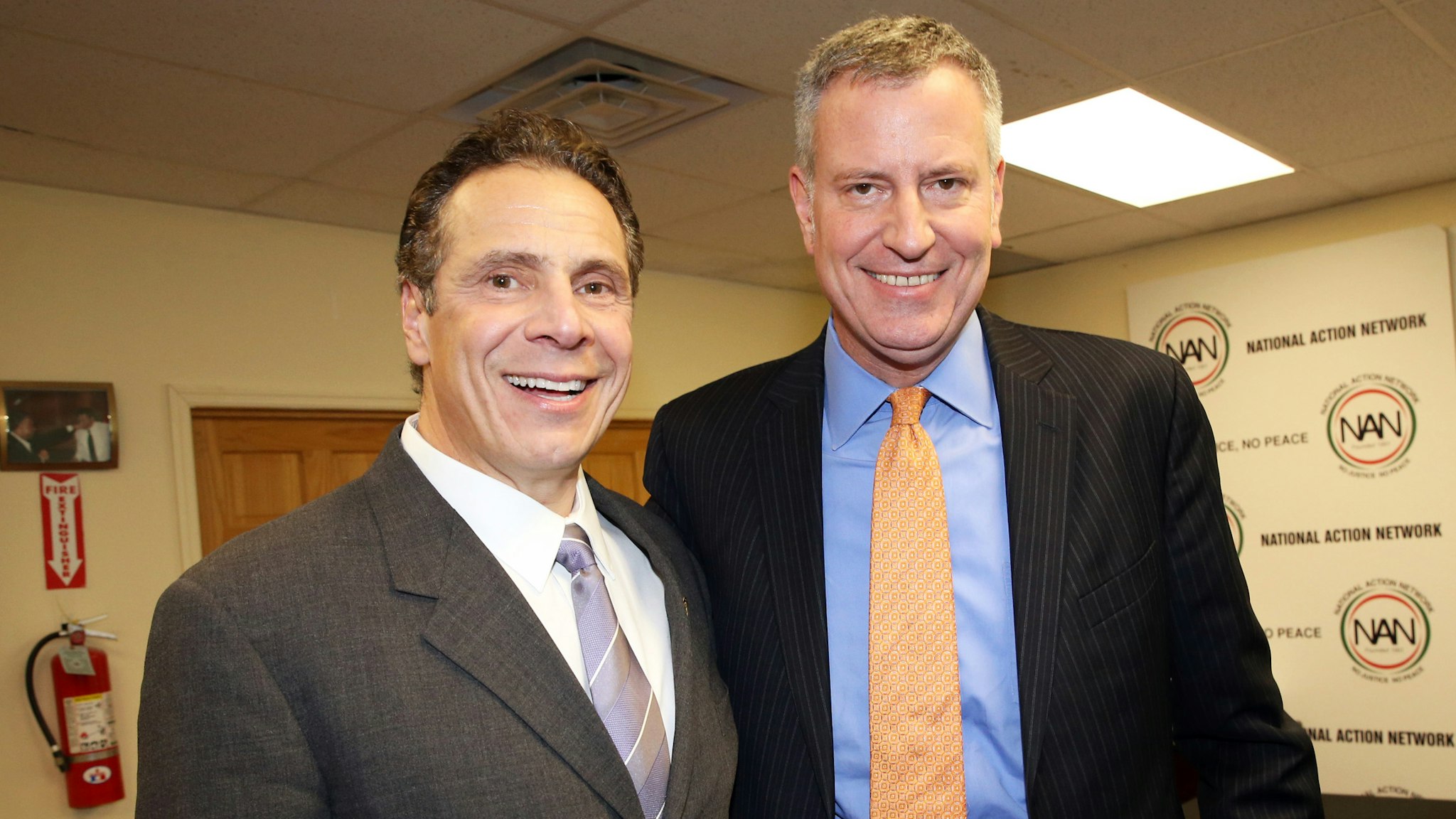 JANUARY 18: (L-R) New York Governor Andrew Cuomo and New York city Mayor Bill de Blasio attend the National Action Network Martin Luther King Day Public Policy Forum on January 18, 2016, in New York City.