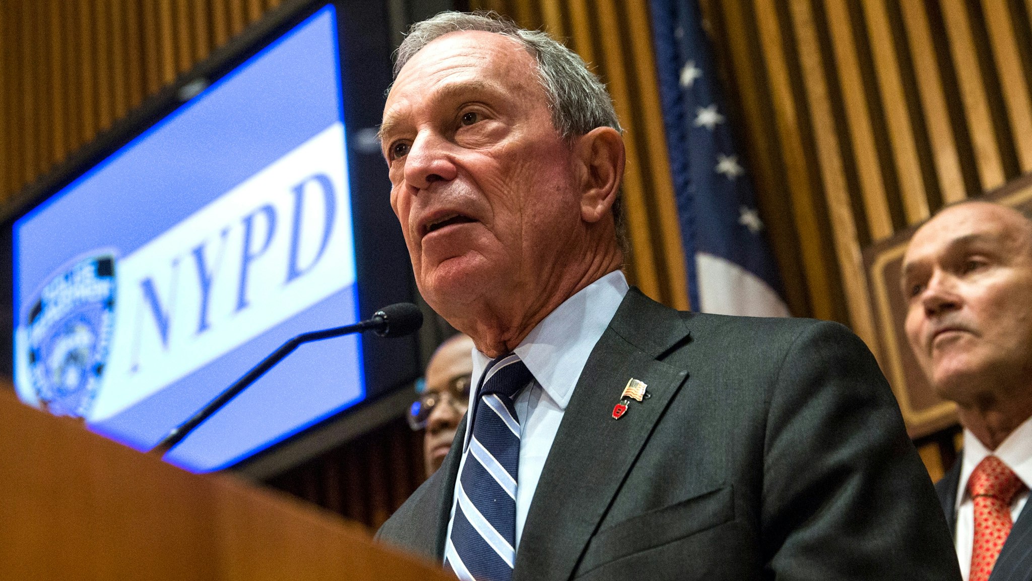 NEW YORK, NY - AUGUST 19: New York City Mayor Michael Bloomberg (C) speaks as New York Police Department (NYPD) Commissioner Ray Kelly (R) listens during a press conference to announce an operation that seized the largest number of illegal guns in the city's history on August 19, 2013 in New York City. The operation, which involved an undercover agent buying guns that were smuggled from North Carolina and South Carolina, yeilded over 250 guns. 19 people have been charged in the operation.