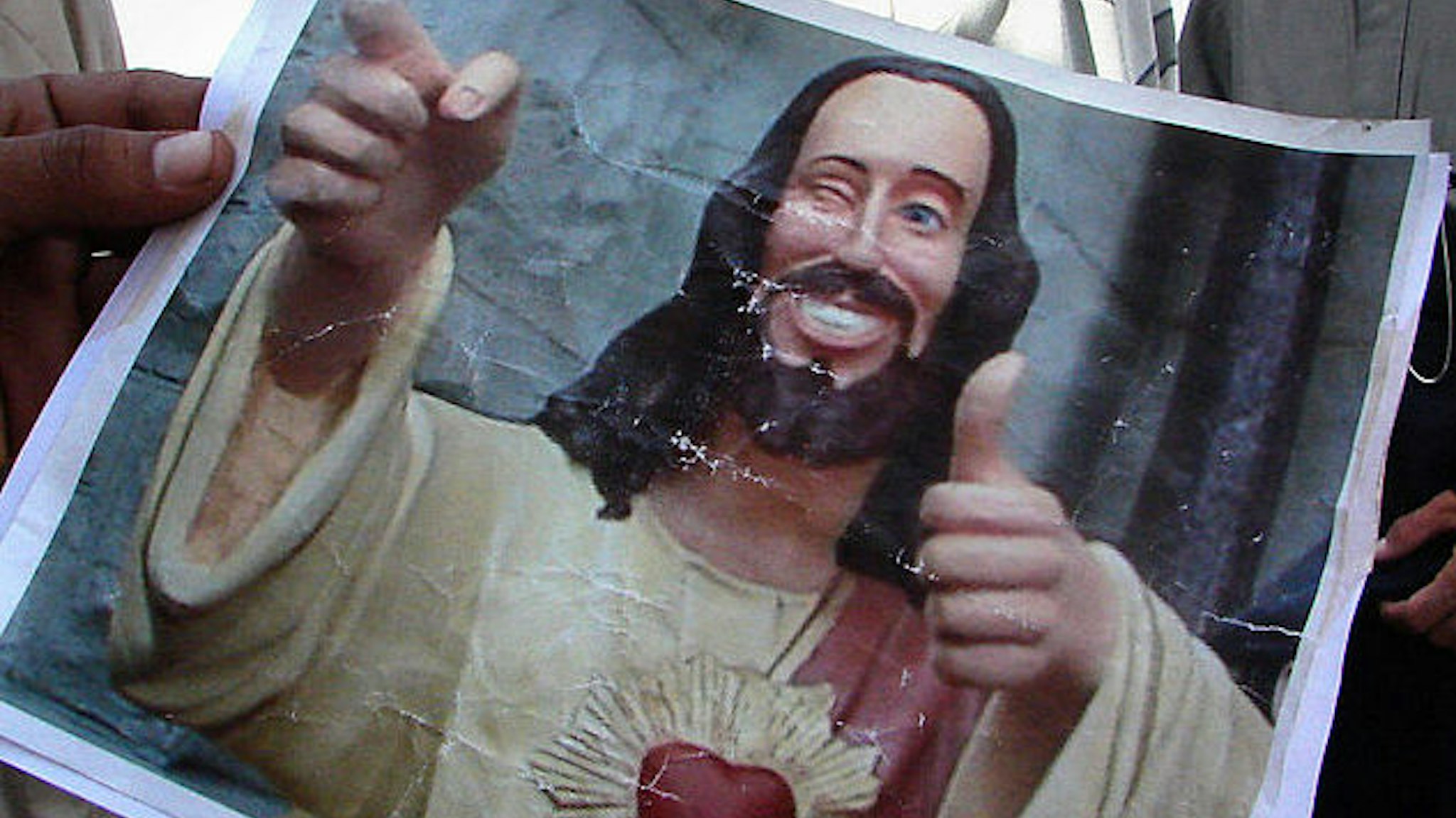 A picture of "Buddy Jesus" from the 1999 film "Dogma." (Photo credit should read WISSAM AL-OKAILI/AFP via Getty Images)