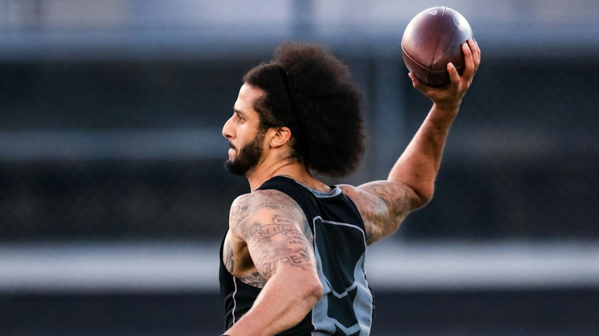 Colin Kaepernick looks to pass during his NFL workout held at Charles R Drew high school on November 16, 2019 in Riverdale, Georgia. (Photo by Carmen Mandato/Getty Images)