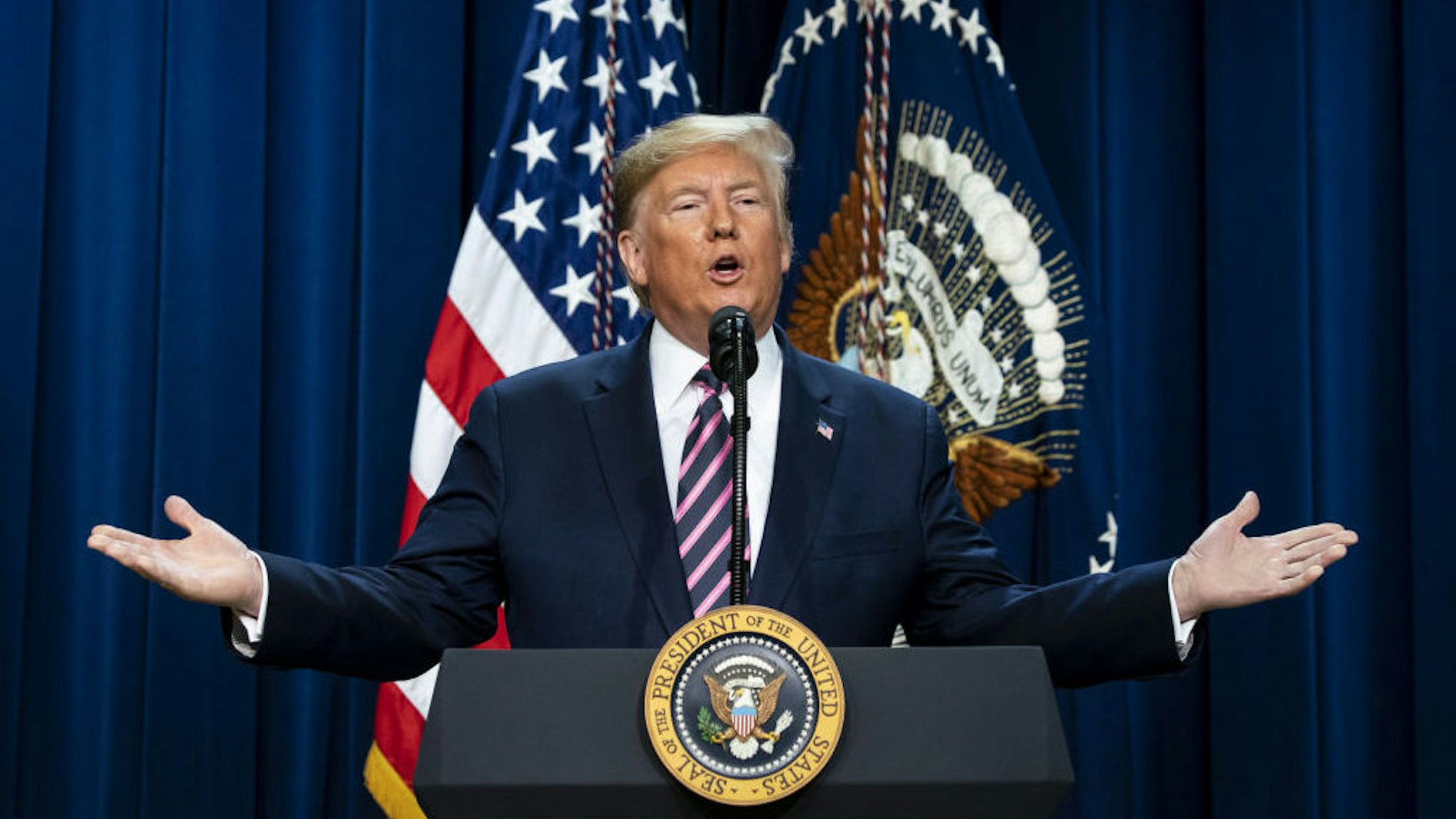 U.S. President Donald Trump speaks during an event at the Eisenhower Executive Office Building in Washington, D.C., U.S., on Thursday, Dec. 19, 2019. The summit was set to discuss mental health treatment as a way to combat homelessness, violence and substance abuse. Photographer: Al Drago/Bloomberg