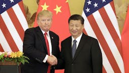 Donald Trump Xi Jinping U.S. President Donald Trump, left, and Xi Jinping, China's president, shake hands during a news conference at the Great Hall of the People in Beijing, China, on Thursday, Nov. 9, 2017. Donald Trump and Vladimir Putin will meet in Helsinki, Finland, on July 16 for their first bilateral summit as the leaders seek to reverse a downward spiral in relations that has been exacerbated by findings that Russia meddled in U.S. elections. Our editors select a set of archive images of U.S. President Donald Trump ahead of the summit meeting. Photographer: Qilai Shen/Bloomberg