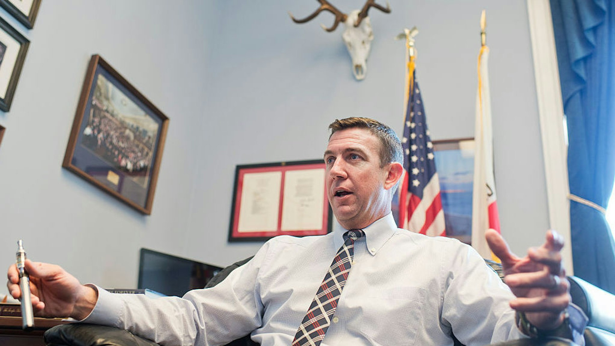 Rep. Duncan Hunter, R-Calif., is interviewed about his vaporizer pen in his Rayburn office, January 12, 2016. (Photo By Tom Williams/CQ Roll Call)