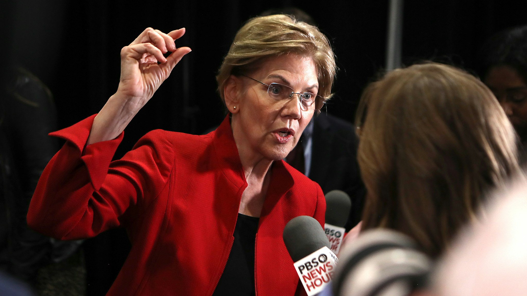 DECEMBER 19: Sen. Elizabeth Warren (D-MA) speaks with the media after the Democratic presidential primary debate at Loyola Marymount University on December 19, 2019 in Los Angeles, California. Seven candidates out of the crowded field qualified for the 6th and last Democratic presidential primary debate of 2019 hosted by PBS NewsHour and Politico.