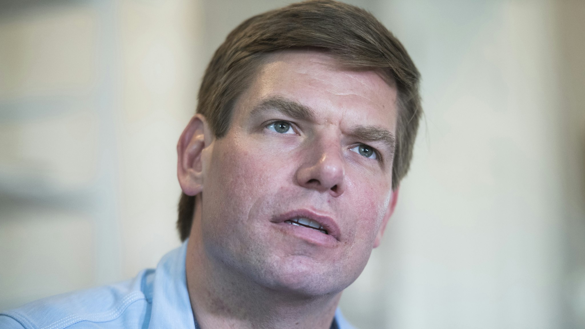 UNITED STATES - MAY 30: Rep. Eric Swalwell, D-Calif., his wife, Brittany, their son, Nelson, 2, and daughter, Cricket, 7 months, sit for an interview with CQ Roll Call in their Northeast D.C., home on Thursday, May 30, 2019.