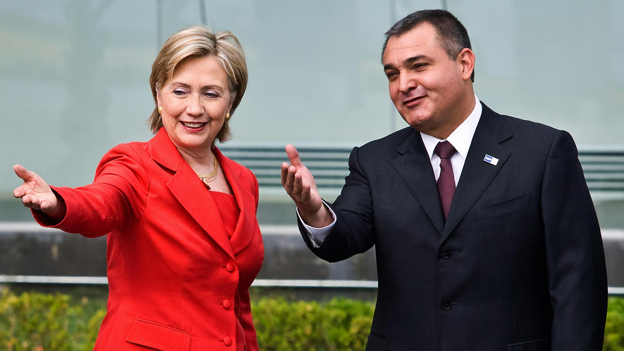 US Secretary of State Hillary Clinton (L) gestures next to the Secretary of the Federal Public Security Genaro Garcia Luna upon her arrival to the Center Command of the Mexican Federal Police in Mexico City, on March 26, 2009. Clinton is in Mexico for a two-day visit.