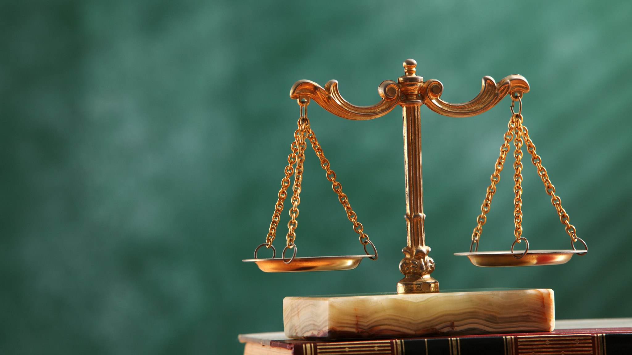 Close-Up Of Scales Of Justice - stock photo