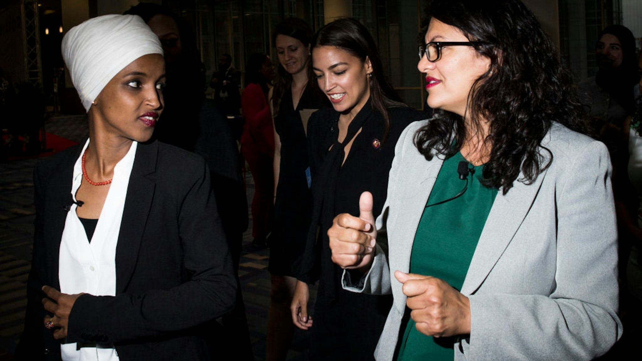 p. Ilhan Omar (D-MN), Rep. Alexandria Ocasio-Cortez (D-NY) and Rep. Rashida Tlaib (D-MI) arrive before participating during a town hall hosted by the NAACP on September 11, 2019 in Washington, DC.