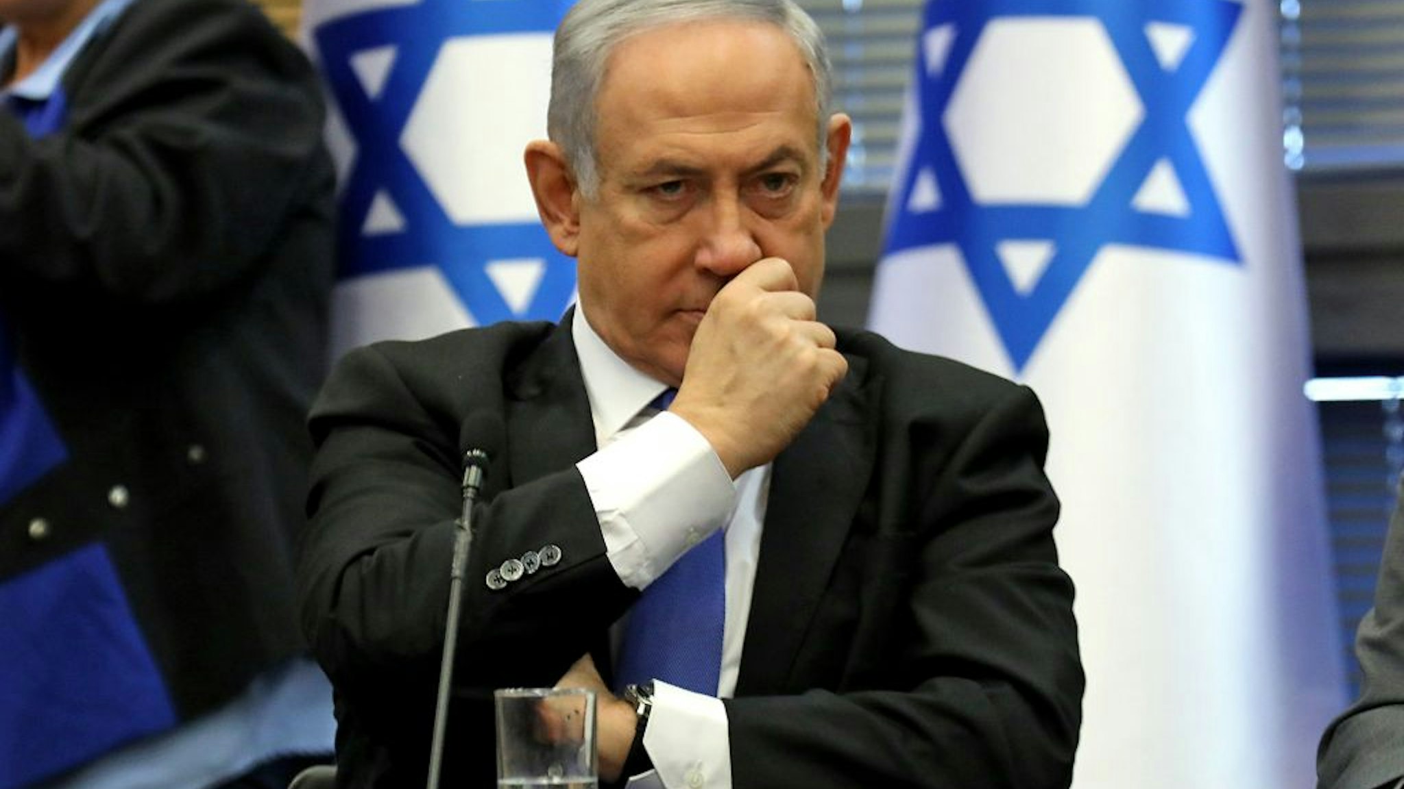 Israeli Prime Minister Benjamin Netanyahu reacts during a meeting of the right-wing bloc at the Knesset (Israeli parliament) in Jerusalem on November 20, 2019.
