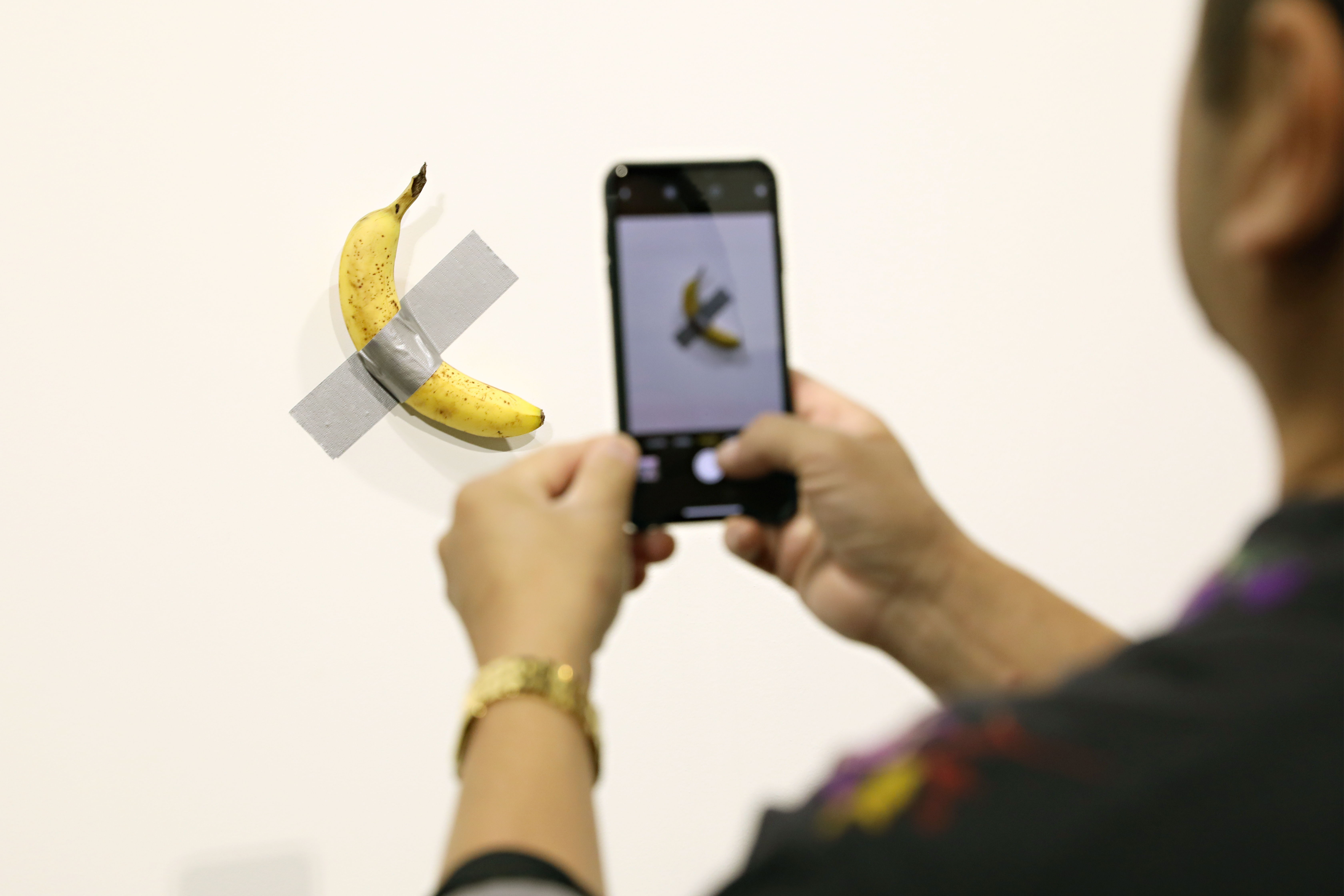 WATCH A Performance Artist ATE That 120 000 Banana Art Taped To A   GettyImages 1186761459 