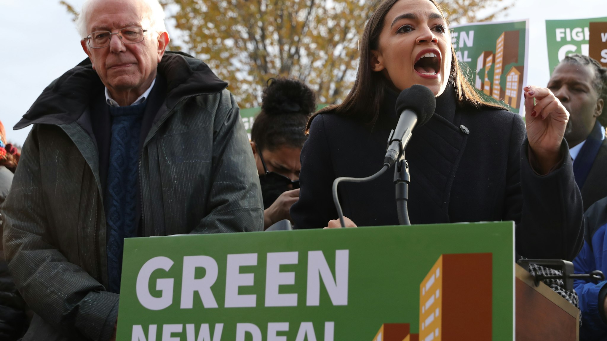 WASHINGTON, DC - NOVEMBER 14: Democratic presidential candidate Sen. Bernie Sanders (I-VT) (L) and Rep. Alexandria Ocasio-Cortez (D-NY) hold a news conference to introduce legislation to transform public housing as part of their Green New Deal proposal outside the U.S. Capitol November 14, 2019 in Washington, DC. The liberal legislators invited affordable housing advocates and climate change activists to join them for the announcement. (Photo by Chip Somodevilla/Getty Images)