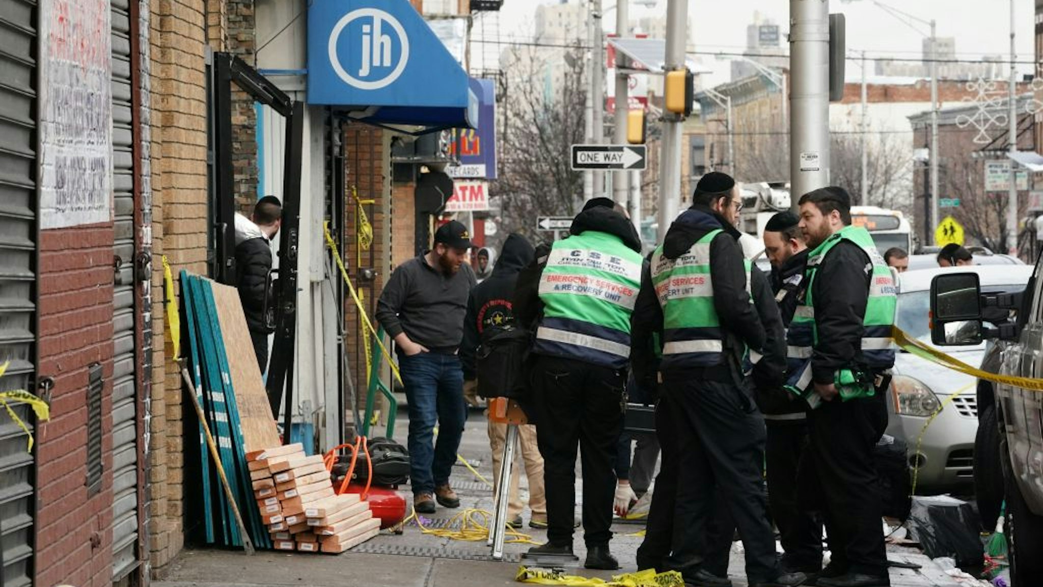 A demolition and recovery crew works at the scene of the December 10, 2019 shooting at a Jewish Deli on December 11, 2019 in Jersey City.
