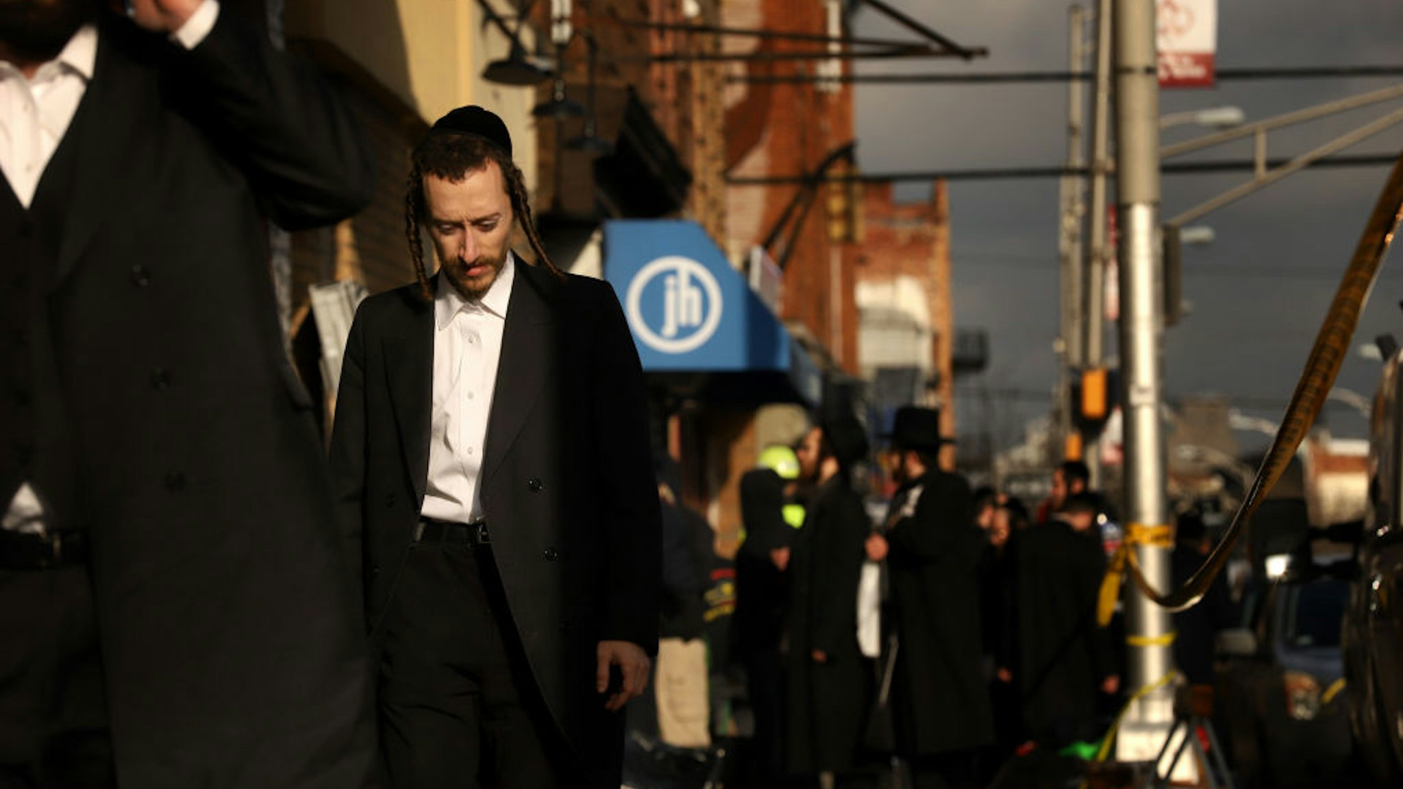 Members of the Jewish community gather around the JC Kosher Supermarket on December 11, 2019 in Jersey City, New Jersey.