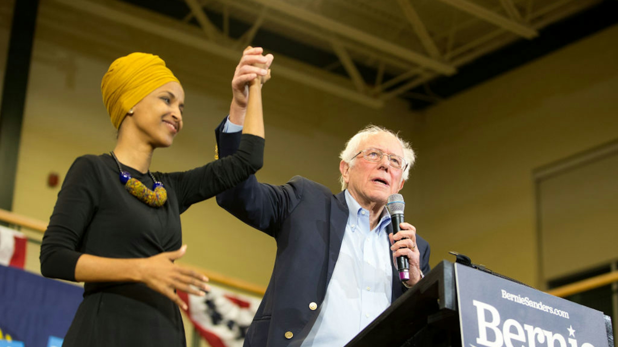 Democratic presidential candidate, Sen. Bernie Sanders (I-VT), and Representative Ilhan Omar (D-MN) on stage during Sanders' event at Nashua Community College on December 13, 2019 in Nashua, New Hampshire.
