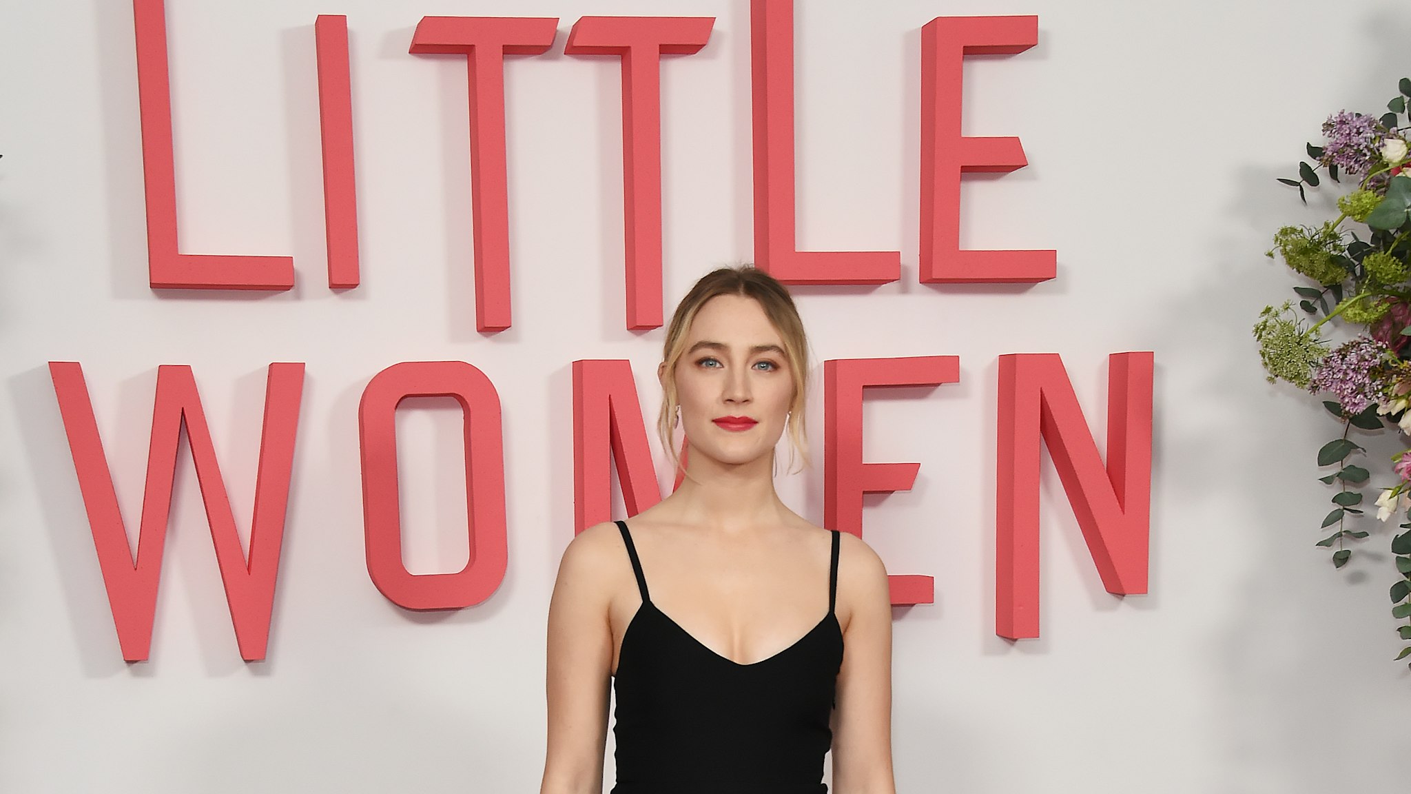 LONDON, ENGLAND - DECEMBER 15: Saoirse Ronan poses at the evening photocall for "Little Women" at The Soho Hotel London on December 16, 2019 in London, England. (Photo by David M. Benett/Dave Benett/WireImage)