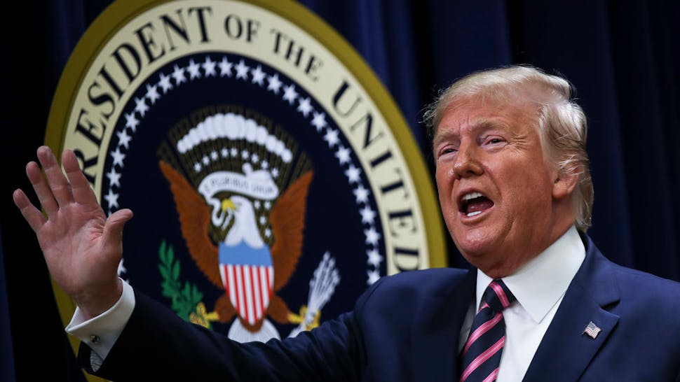 President Trump Delvers Remarks At White House Mental Health Summit WASHINGTON, DC DECEMBER 19: U.S. President Donald Trump waves after speaking at a White House Mental Health Summit in the South Court Auditorium of the Eisenhower Executive Office Building at the White House on December 19, 2019 in Washington, DC.