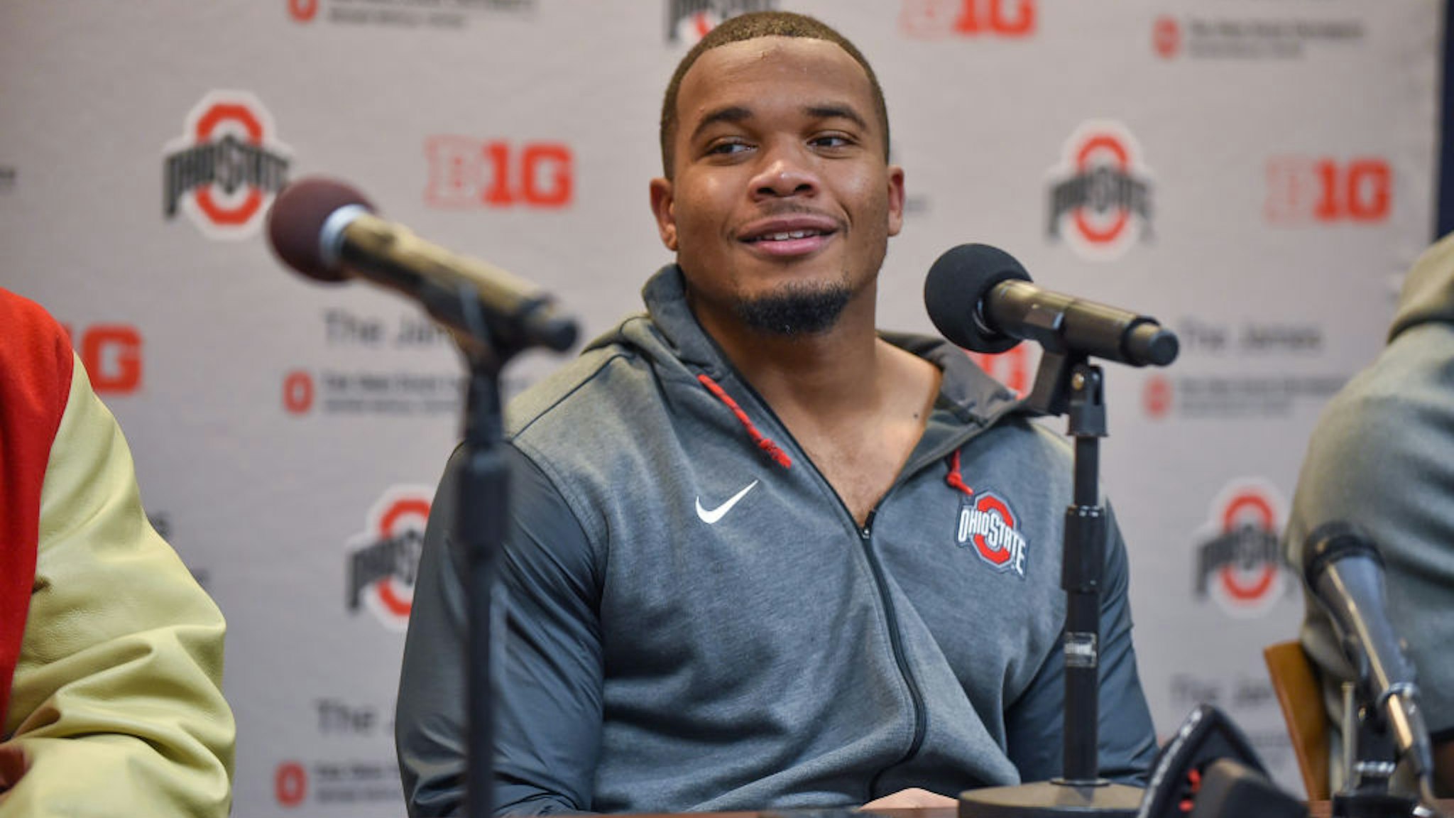 Running Back J.K. Dobbins #2 of the Ohio State Buckeyes speaks during the post game press conference after a college football game against the Michigan Wolverines at Michigan Stadium on November 30, 2019 in Ann Arbor, Michigan.