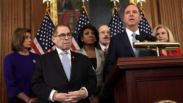 WASHINGTON, DC - DECEMBER 10: Chairman of House Intelligence Committee Rep. Adam Schiff (D-CA) (5th L) speaks as (L-R) Speaker of the House Rep. Nancy Pelosi (D-CA), Chairman of House Judiciary Committee Rep. Jerry Nadler (D-NY), Chairwoman of House Financial Services Committee Rep. Maxine Waters (D-CA), Chairman of House Foreign Affairs Committee Rep. Eliot Engel (D-NY) and Chairwoman of House Oversight and Reform Committee Rep. Carolyn Maloney (D-NY) listen during a news conference at the U.S. Capitol December 10, 2019 in Washington, DC.