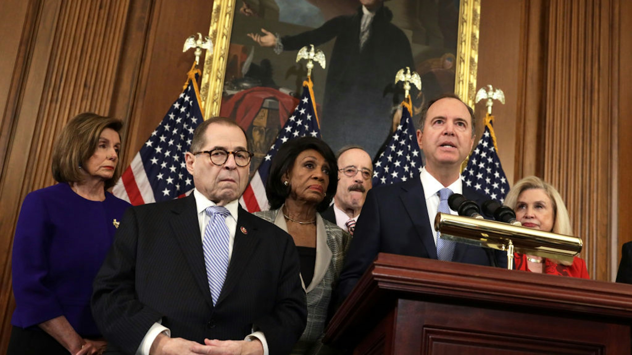 WASHINGTON, DC - DECEMBER 10: Chairman of House Intelligence Committee Rep. Adam Schiff (D-CA) (2nd-R) speaks as (L-R) Speaker of the House Rep. Nancy Pelosi (D-CA), Chairman of House Judiciary Committee Rep. Jerry Nadler (D-NY), Chairwoman of House Financial Services Committee Rep. Maxine Waters (D-CA), Chairman of House Foreign Affairs Committee Rep. Eliot Engel (D-NY) and Chairwoman of House Oversight and Reform Committee Rep. Carolyn Maloney (D-NY) listen during a news conference at the U.S. Capitol December 10, 2019 in Washington, DC. Chairman Nadler announced that the House Judiciary Committee is introducing two articles on abuse of power and obstruction of Congress for the next steps in the House impeachment inquiry against President Donald Trump.