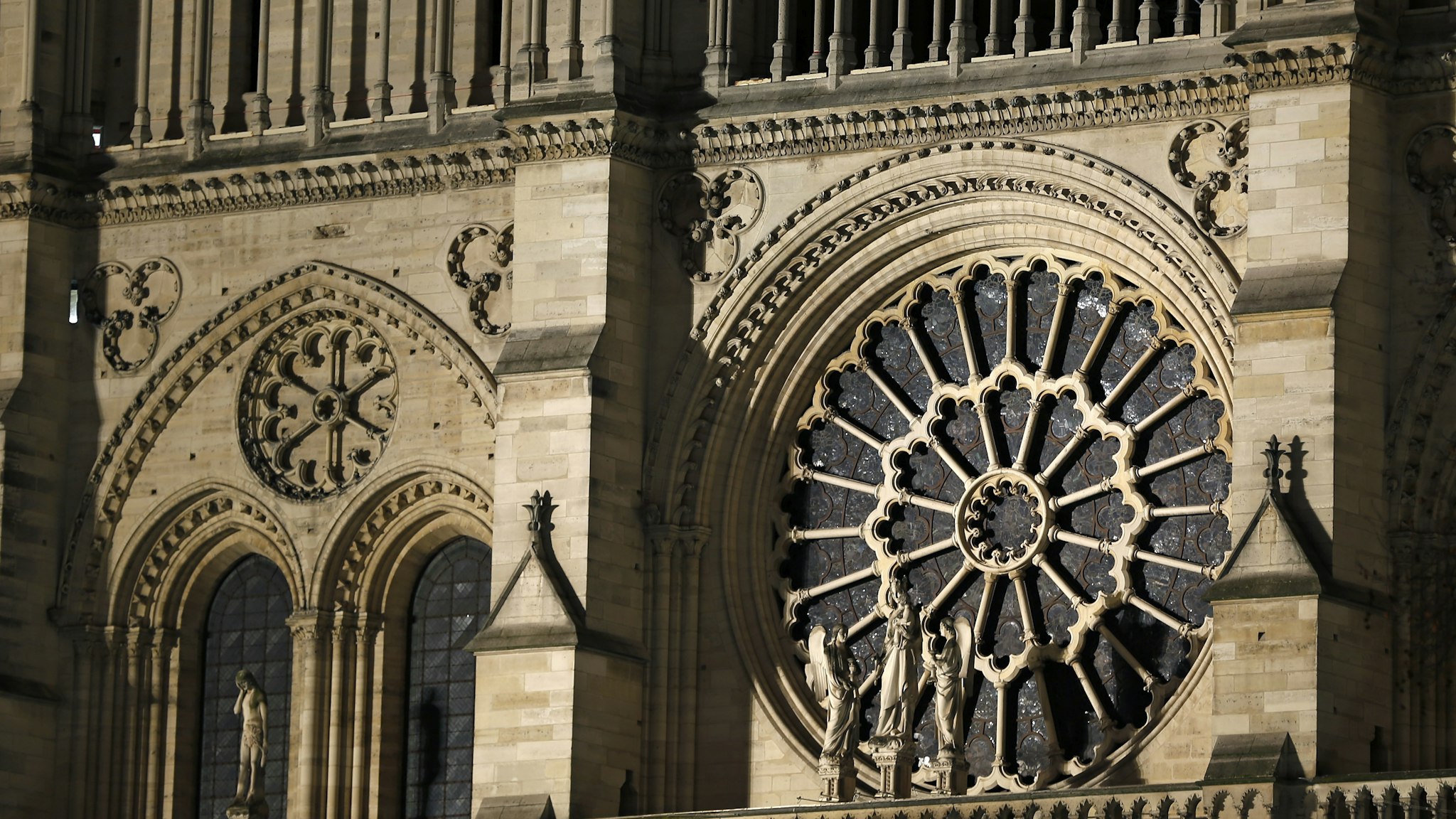 PARIS, FRANCE - DECEMBER 17: The facade of Notre-Dame cathedral is again illuminated at night more than eight months after the fire that ravaged the emblematic monument on December 17, 2019 in Paris, France. A fire broke out in Notre- Dame Cathedral in the evening of Monday, April 15, and quickly spread to the building's wooden roof destroying the famous spire. The cleaning and consolidation phase of the building should continue until the end of the year. (Photo by Chesnot/Getty Images)PARIS, FRANCE - DECEMBER 17: The facade of Notre-Dame cathedral is again illuminated at night more than eight months after the fire that ravaged the emblematic monument on December 17, 2019 in Paris, France. A fire broke out in Notre- Dame Cathedral in the evening of Monday, April 15, and quickly spread to the building's wooden roof destroying the famous spire. The cleaning and consolidation phase of the building should continue until the end of the year. (Photo by Chesnot/Getty Images)