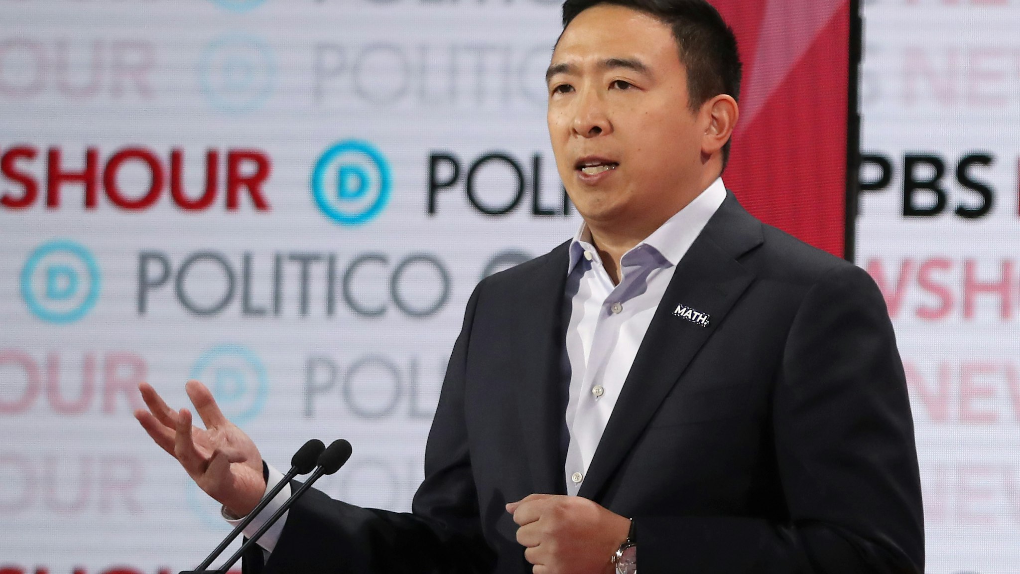LOS ANGELES, CALIFORNIA - DECEMBER 19: Democratic presidential candidate former tech executive Andrew Yang speaks during the Democratic presidential primary debate at Loyola Marymount University on December 19, 2019 in Los Angeles, California. Seven candidates out of the crowded field qualified for the 6th and last Democratic presidential primary debate of 2019 hosted by PBS NewsHour and Politico. (Photo by Justin Sullivan/Getty Images)