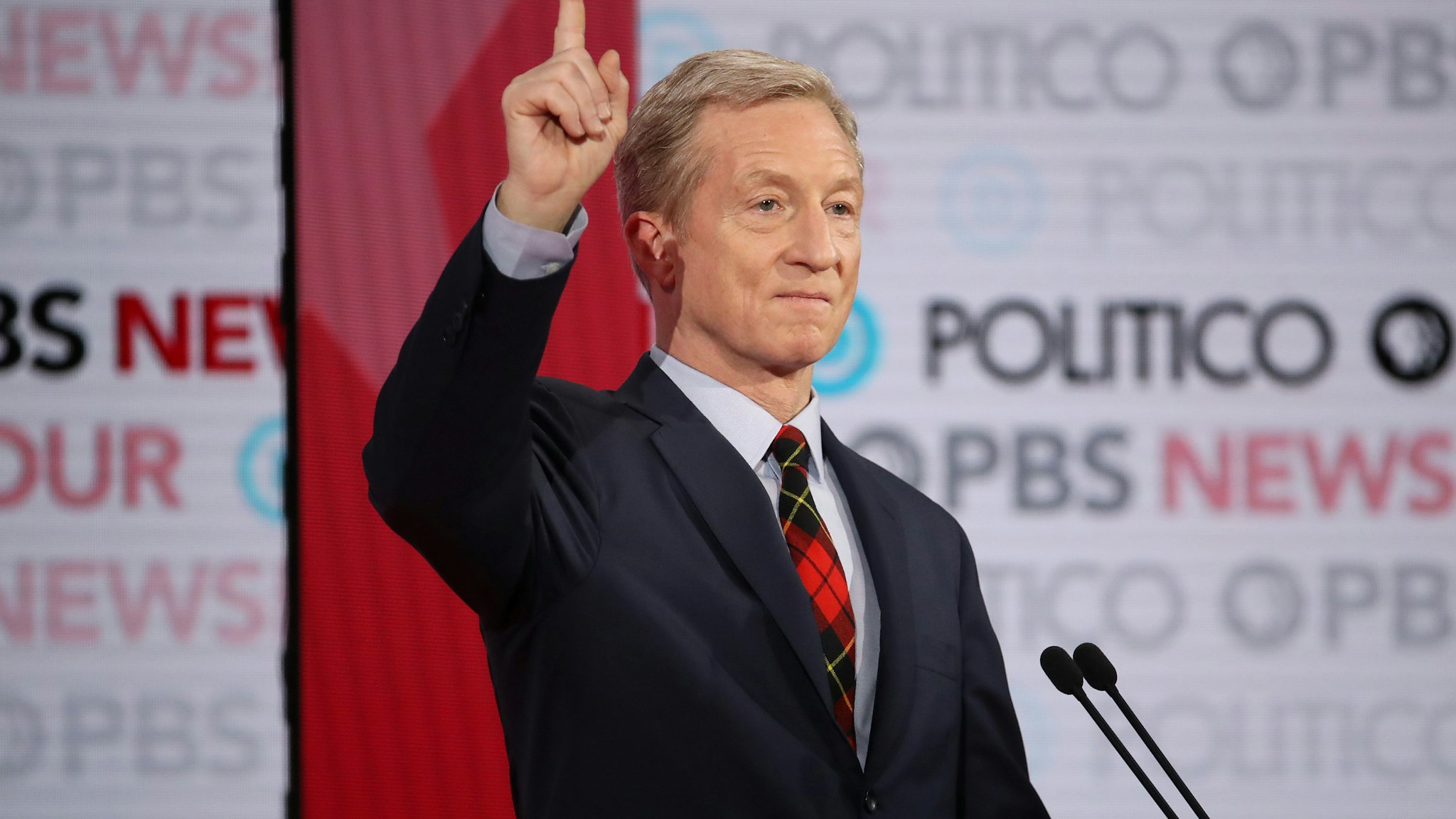 LOS ANGELES, CALIFORNIA - DECEMBER 19: Democratic presidential candidate Tom Steyer gestures during the Democratic presidential primary debate at Loyola Marymount University on December 19, 2019 in Los Angeles, California. Seven candidates out of the crowded field qualified for the 6th and last Democratic presidential primary debate of 2019 hosted by PBS NewsHour and Politico. (Photo by Justin Sullivan/Getty Images)