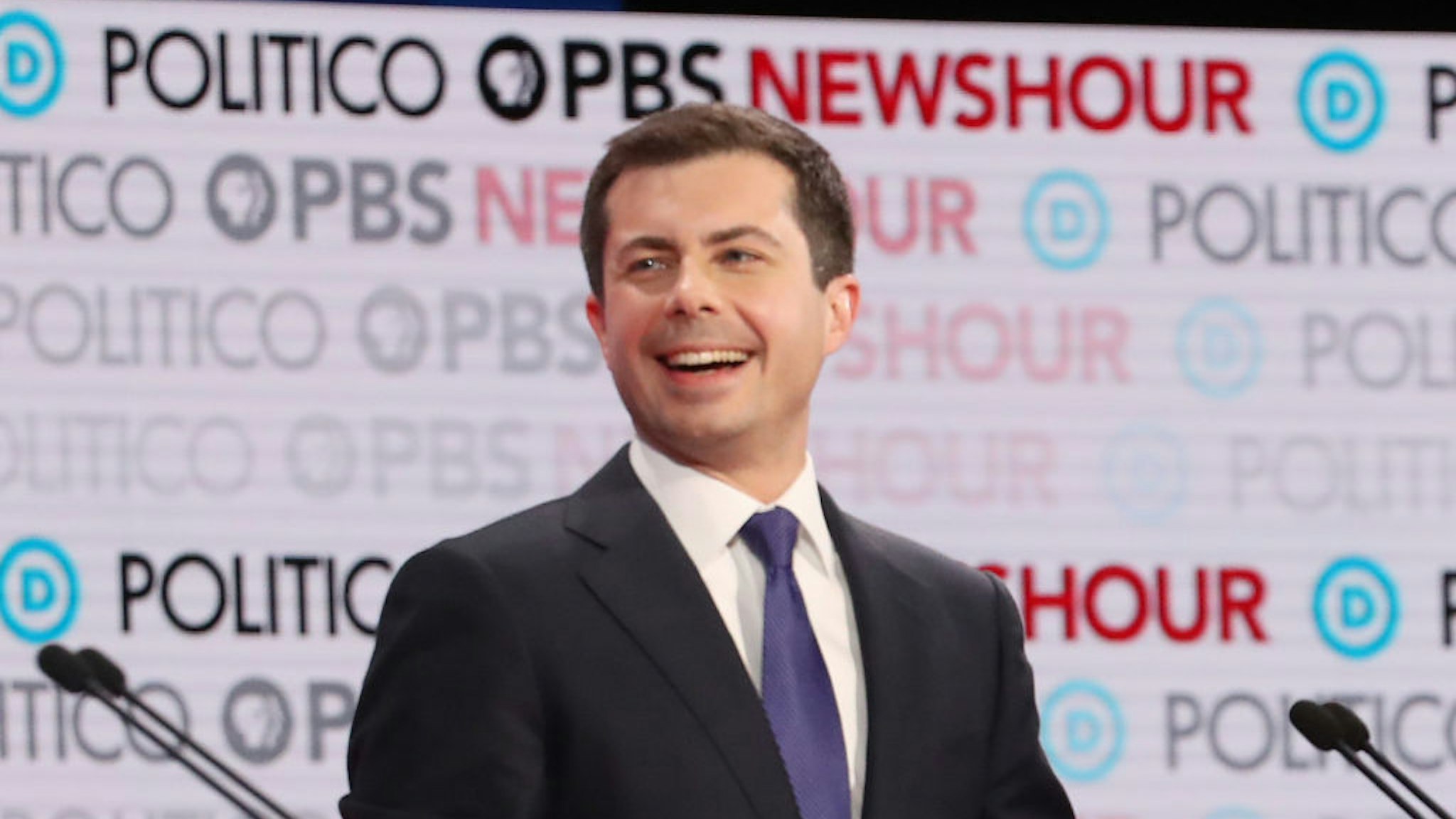 LOS ANGELES, CALIFORNIA - DECEMBER 19: Democratic presidential candidate South Bend, Indiana Mayor Pete Buttigieg reacts during the Democratic presidential primary debate at Loyola Marymount University on December 19, 2019 in Los Angeles, California. Seven candidates out of the crowded field qualified for the 6th and last Democratic presidential primary debate of 2019 hosted by PBS NewsHour and Politico.