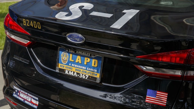 The new Ford Motor Co. Police Responder hybrid vehicle is displayed during an event outside of Los Angeles Police Department (LAPD) headquarters in Los Angeles, California, U.S., on Monday, April 10, 2017.