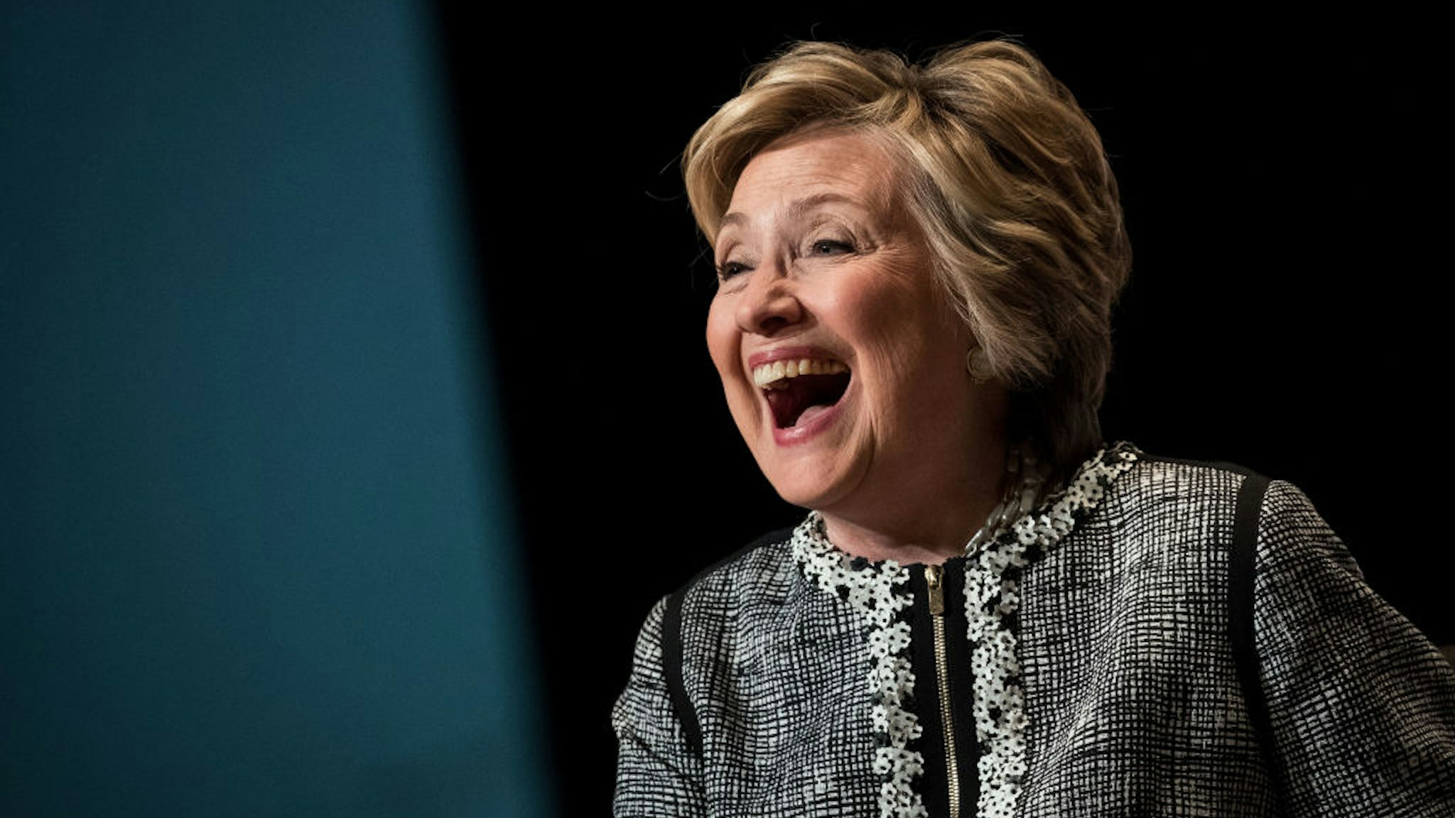 Former U.S. Secretary of State and 2016 presidential candidate Hillary Clinton laughs while speaking during BookExpo 2017 at the Jacob K. Javits Convention Center, June 1, 2017 in New York City.