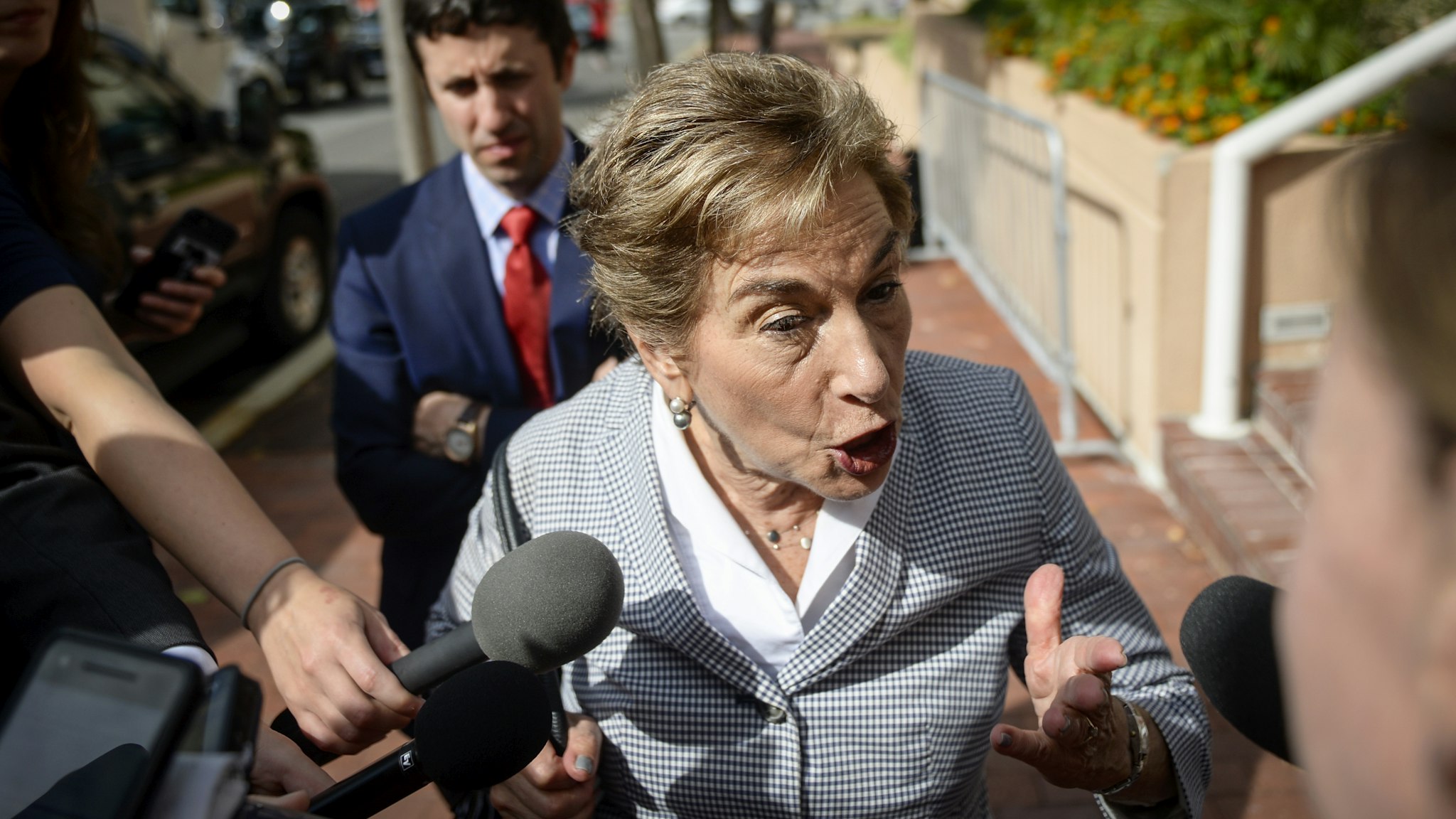 Rep. Jan Schakowsky, D-Ill., talks with reporters as she departs a meeting with other House Democrats to discuss potential border bill changes at the Democratic National Committee on Tuesday June 25, 2019.