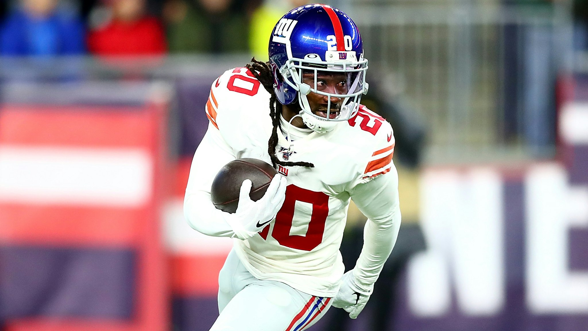 FOXBOROUGH, MASSACHUSETTS - OCTOBER 10: Janoris Jenkins #20 of the New York Giants intercepts a ball intended for Julian Edelman #11 of the New England Patriots during the first quarter in the game at Gillette Stadium on October 10, 2019 in Foxborough, Massachusetts.