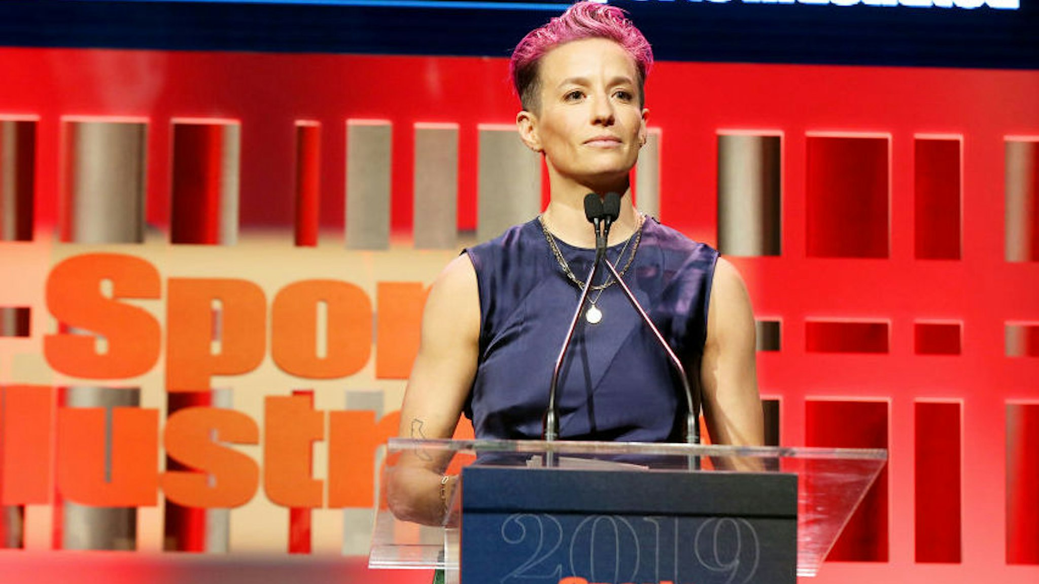 NEW YORK, NEW YORK - DECEMBER 09: Sports Illustrated Sportsperson of the Year Award Winner Megan Rapinoe speaks onstage during the Sports Illustrated Sportsperson Of The Year 2019 at The Ziegfeld Ballroom on December 09, 2019 in New York City.