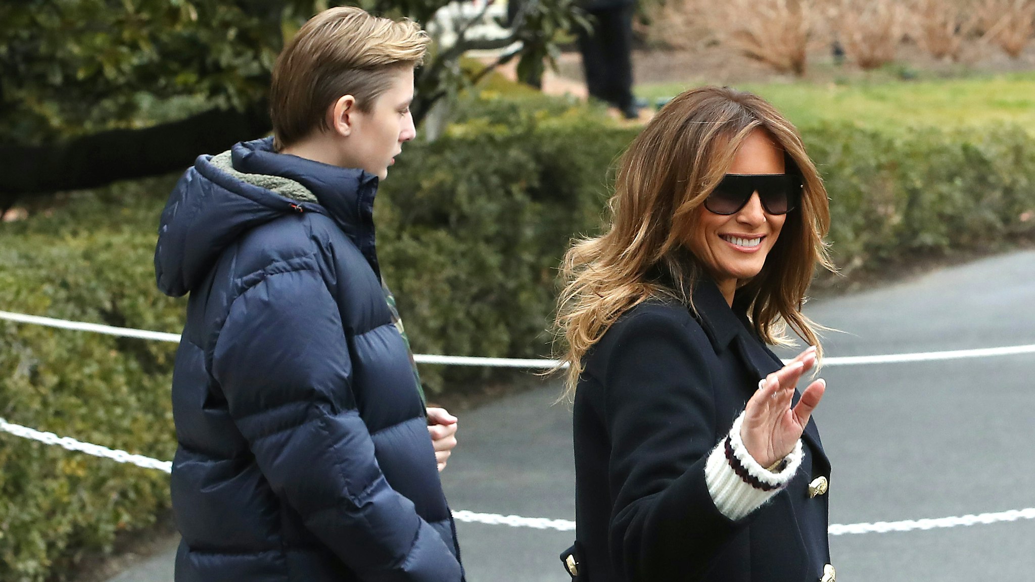 WASHINGTON, DC - MARCH 08: First Lady Melania Trump walks with her son Barron Trump as they depart with U.S. President Donald Trump, from the South Lawn of the White House on March 8, 2019 in Washington, DC. President Trump is headed to Alabama to survey tornado damage.